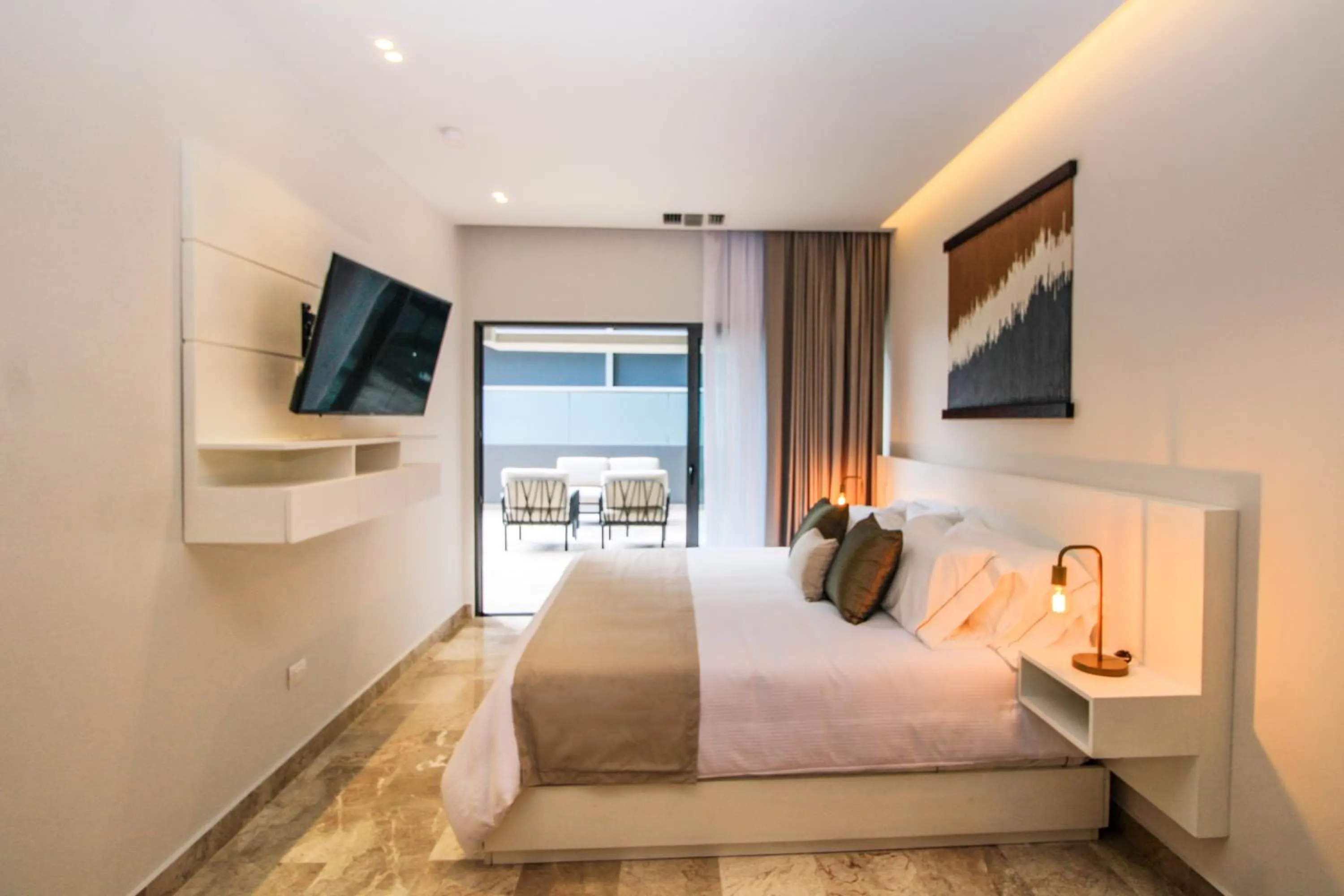 Bed in Singular Dream Vacation Rentals