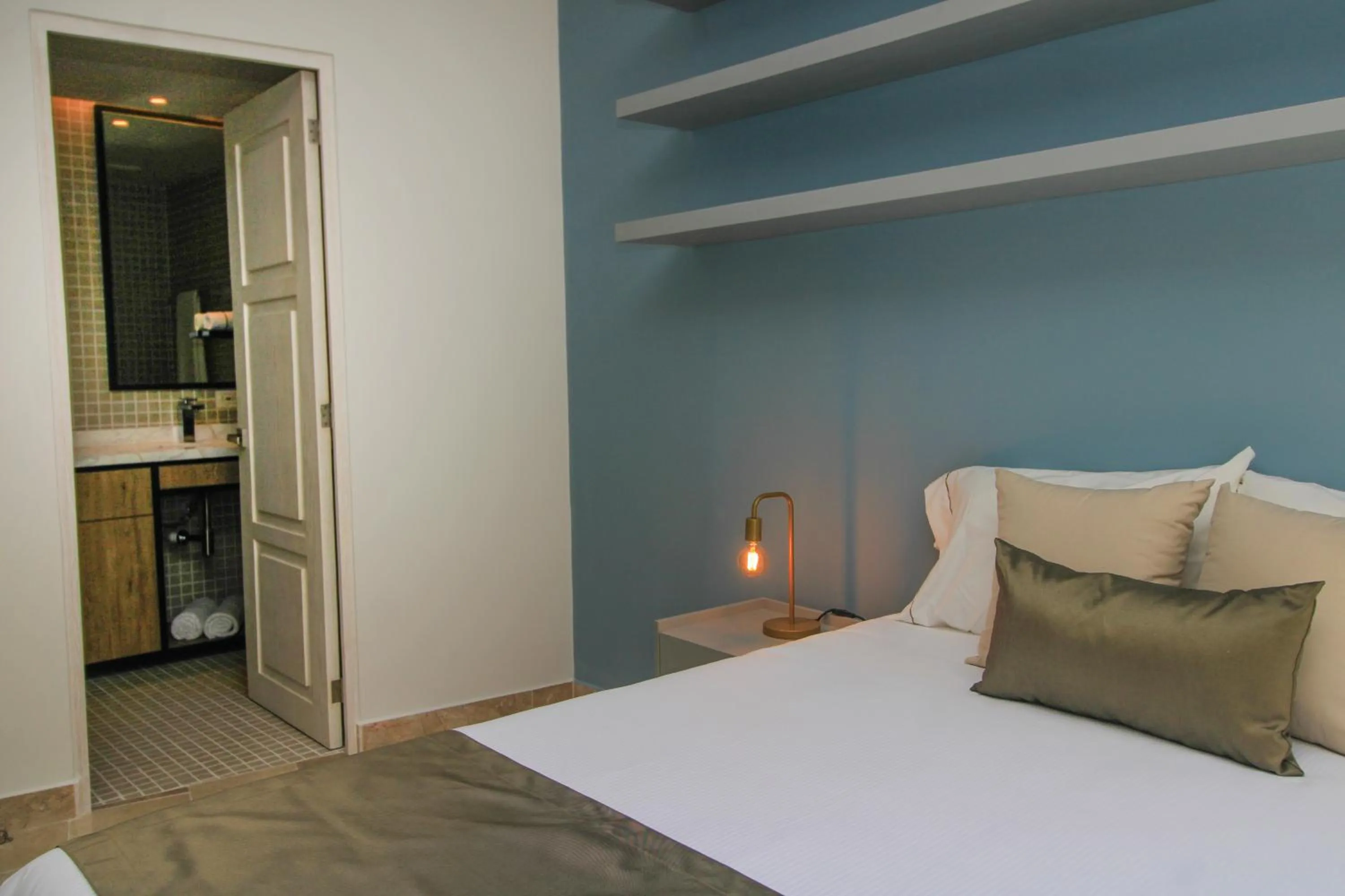 Bathroom, Bed in Singular Dream Vacation Rentals