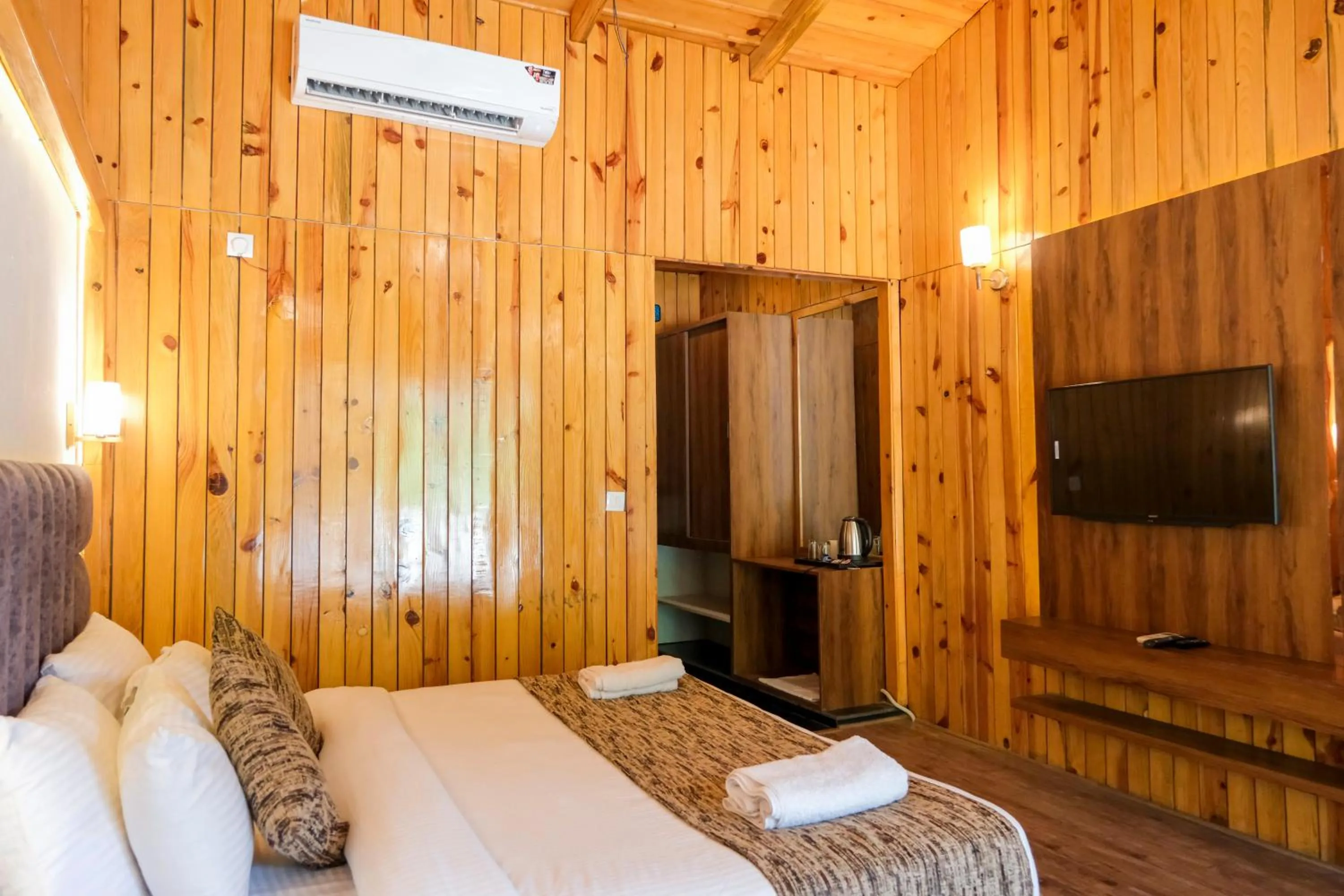 Bed in Qcent Woods Resort & Spa, Rishikesh