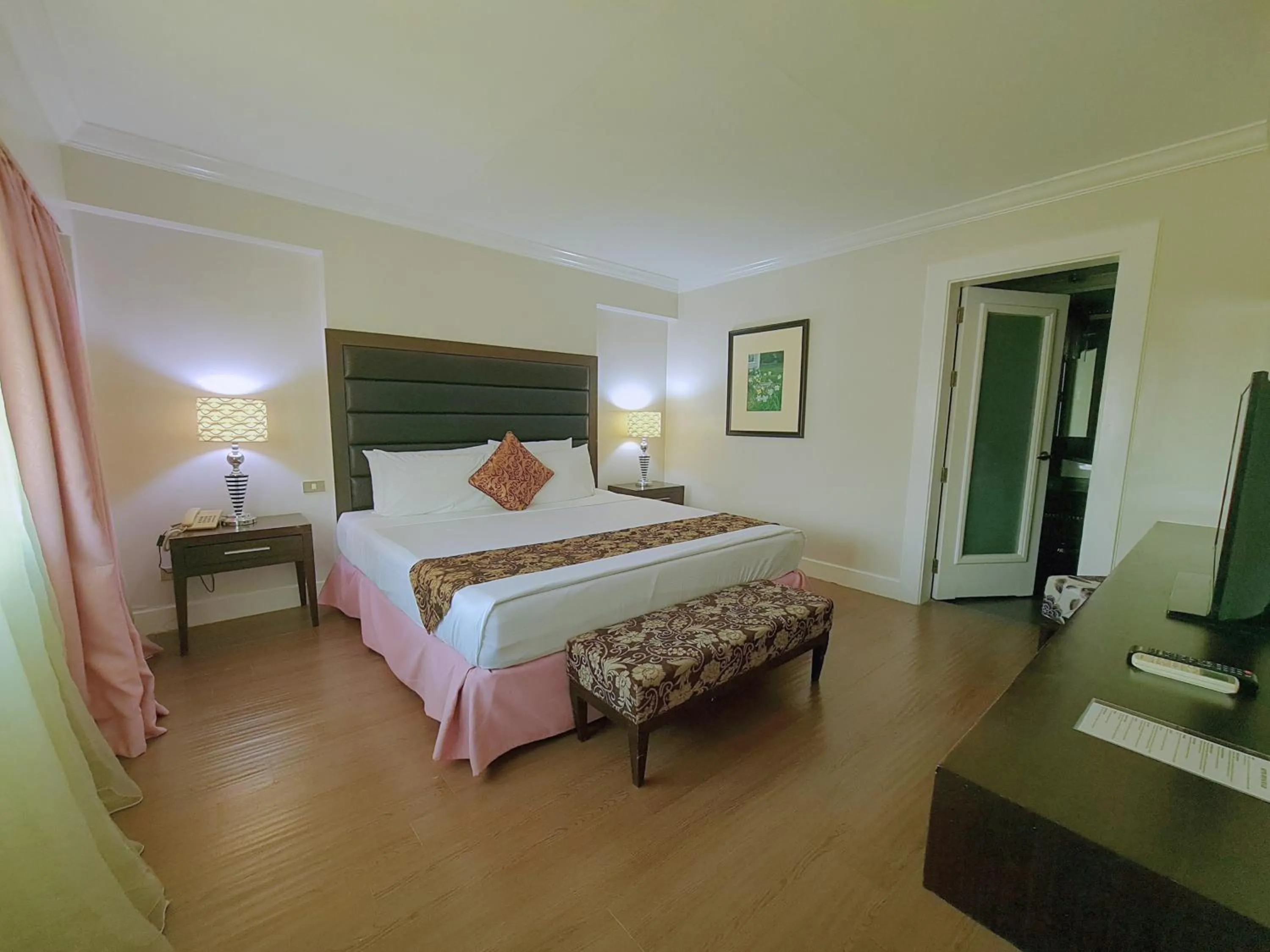 Bed in Fiesta Garden Hotel