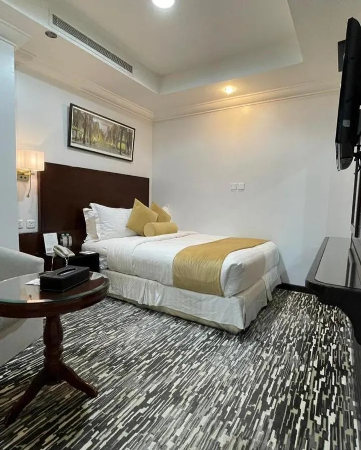 Bed in Carawan Al Khaleej Hotel Olaya