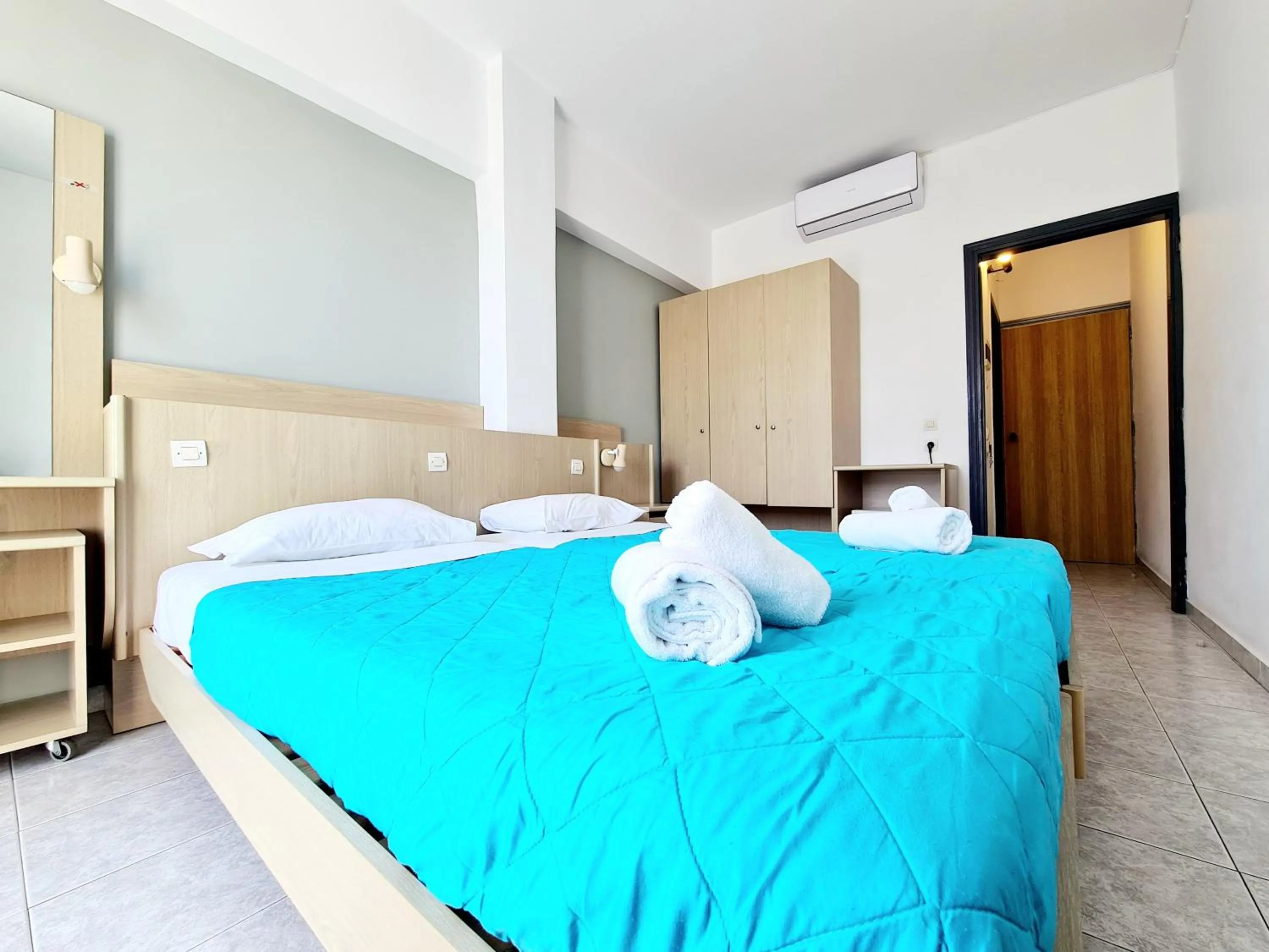 Bed in G92 City Hotel