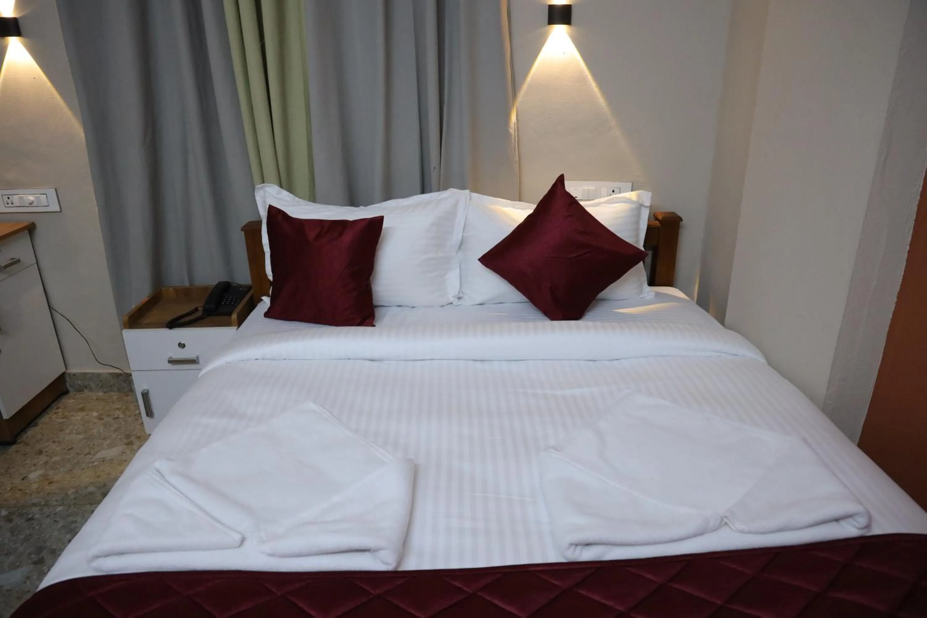 Bed in Dreams Paradise Airport Residency