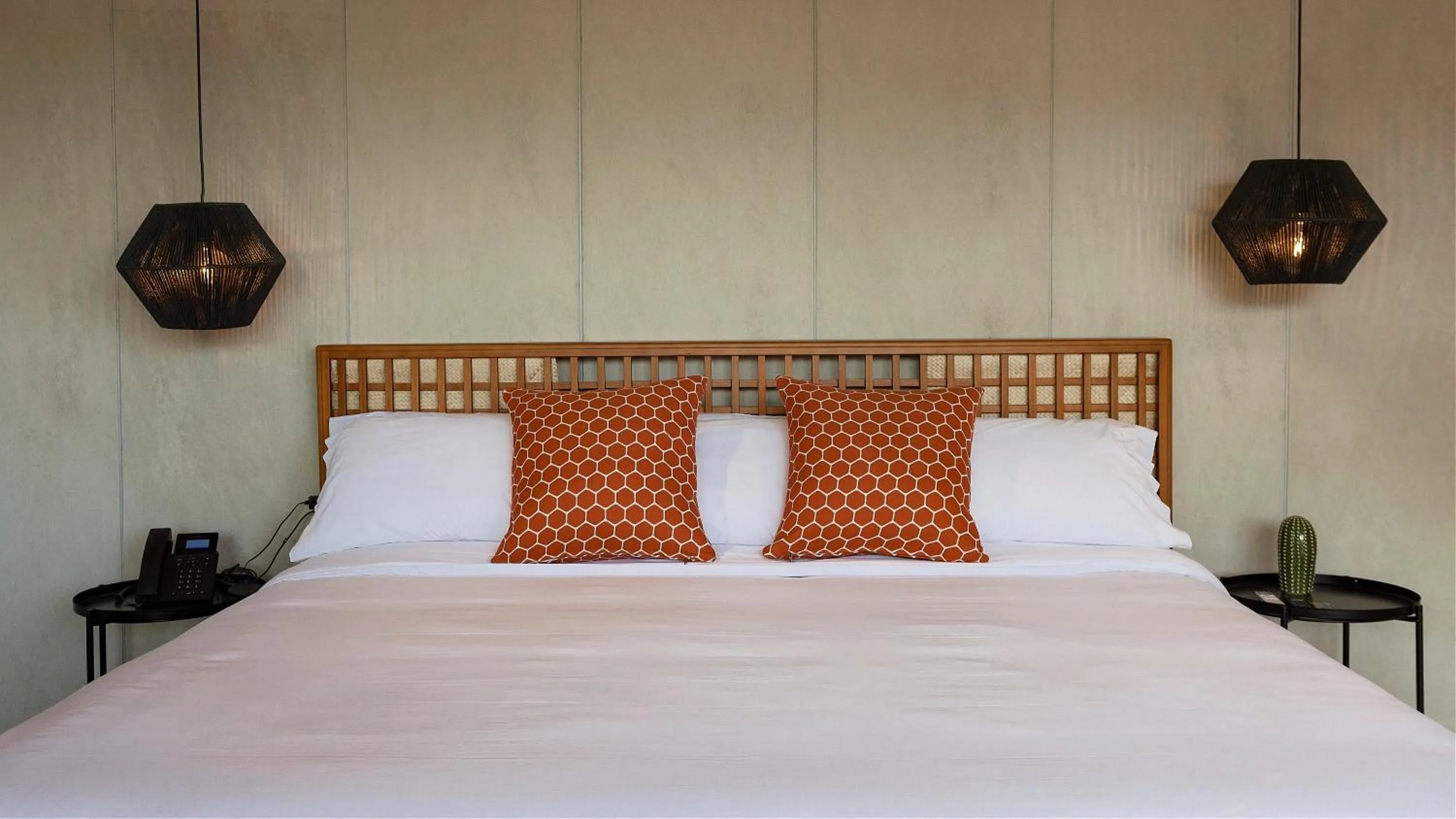 Bed in Eolia Sustainable Design Hotel
