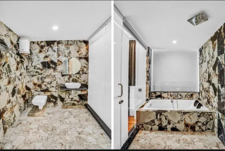 Bathroom in HOTEL THE PARKER INN By KBNT GROUP