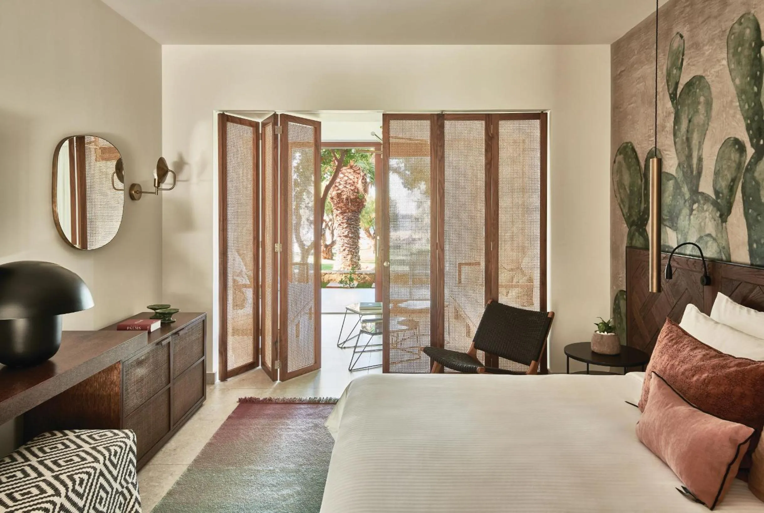 Living room, Bed in Phāea Cretan Malia, a Member of Design Hotels