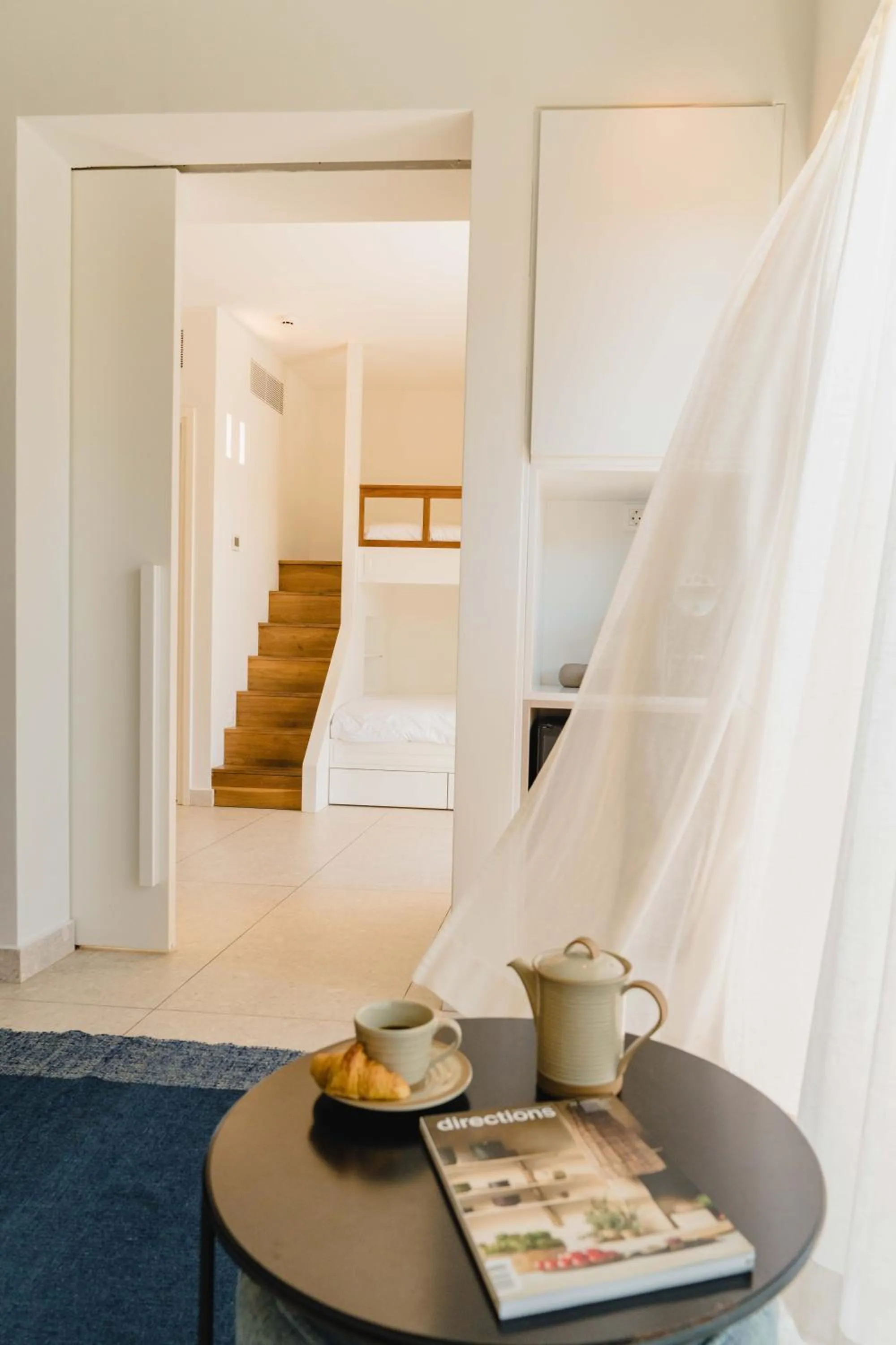 Living room in Phāea Cretan Malia, a Member of Design Hotels