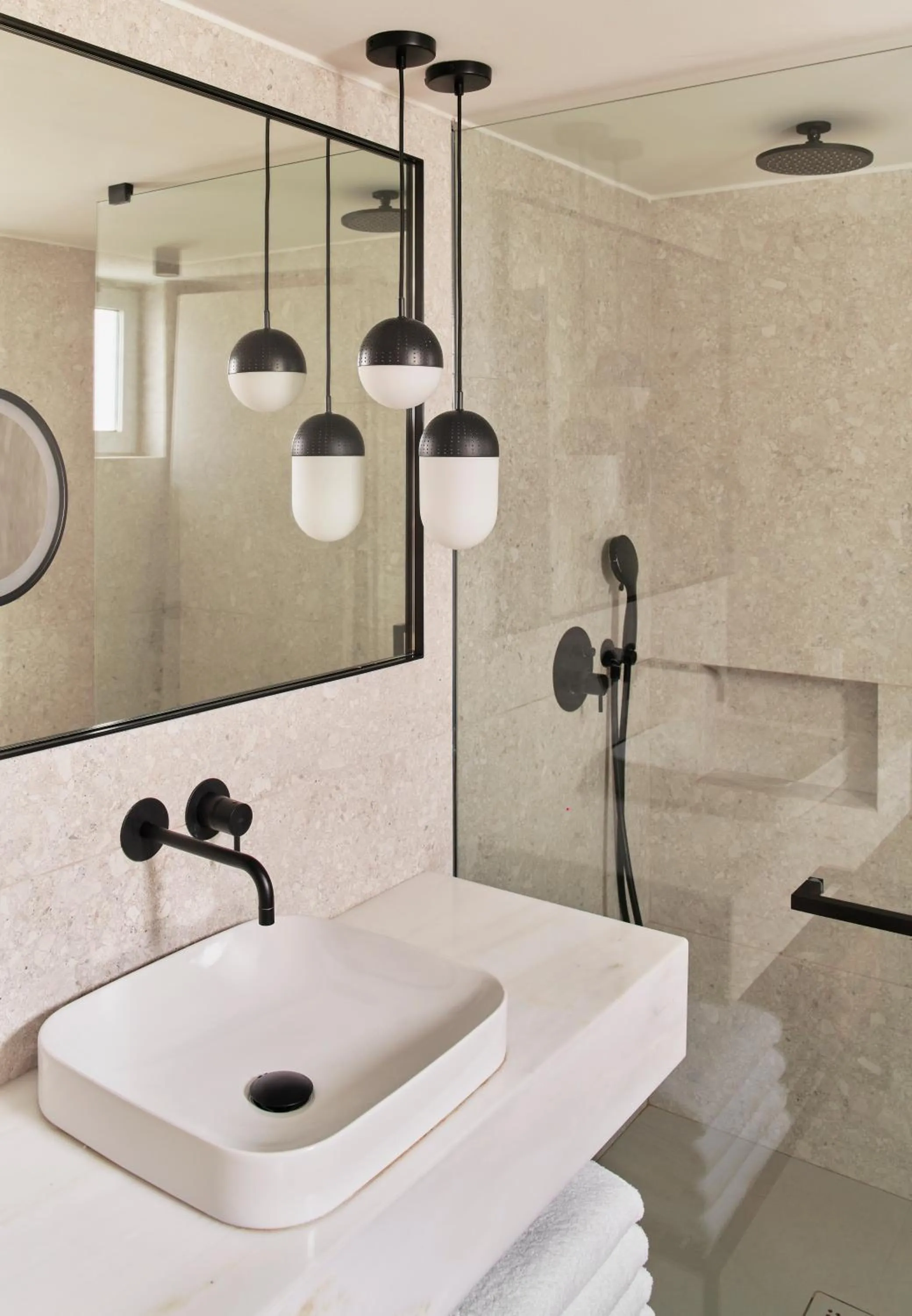 Bathroom in Phāea Cretan Malia, a Member of Design Hotels