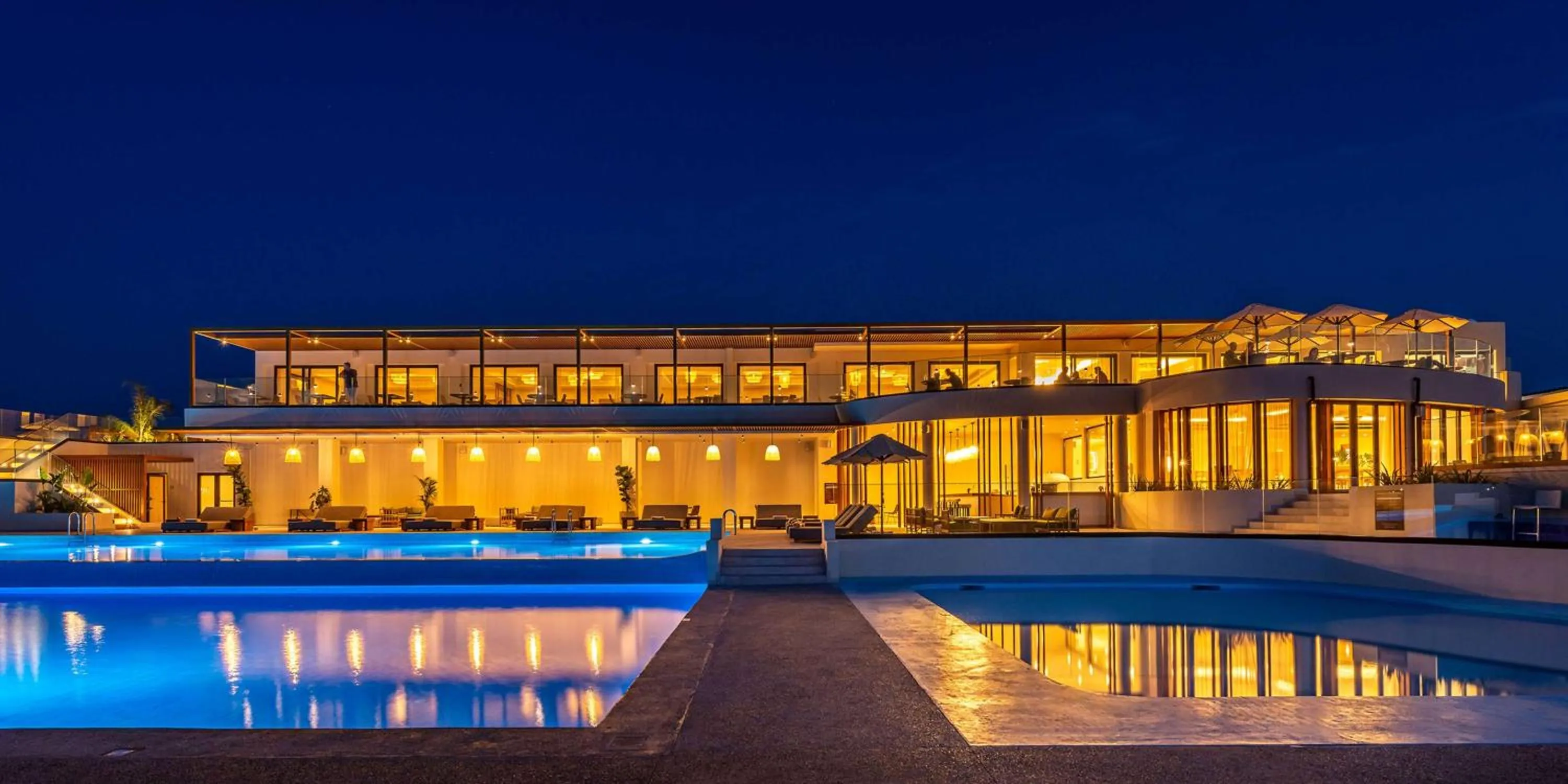 Pool view in Isla Brown Chania Resort, Curio Collection by Hilton