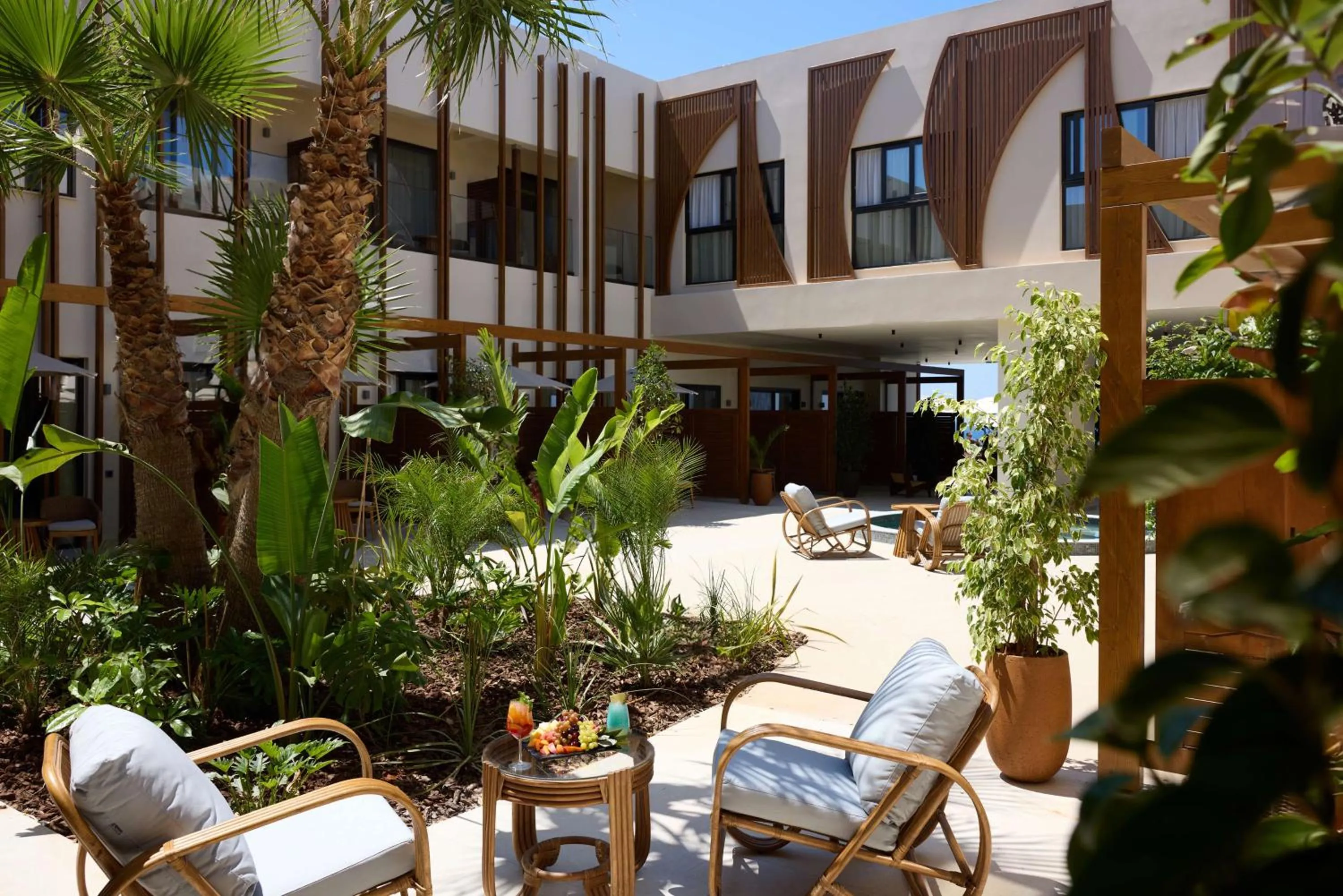 Inner courtyard view in Isla Brown Chania Resort, Curio Collection by Hilton