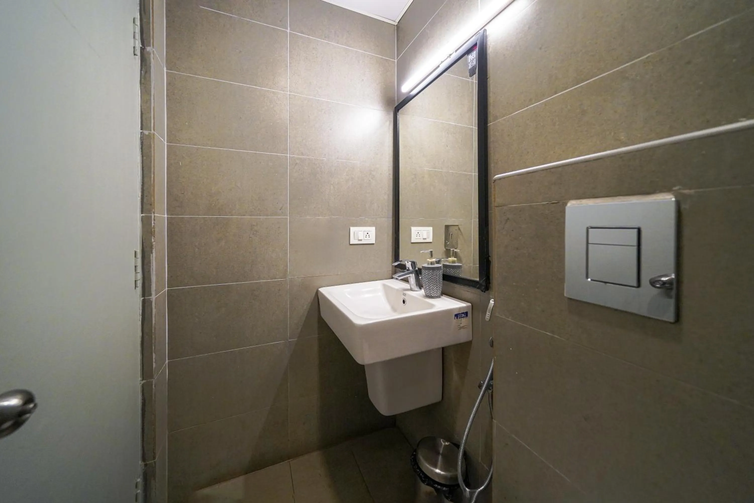 Bathroom in Olive Zip Richmond Circle by Embassy Group