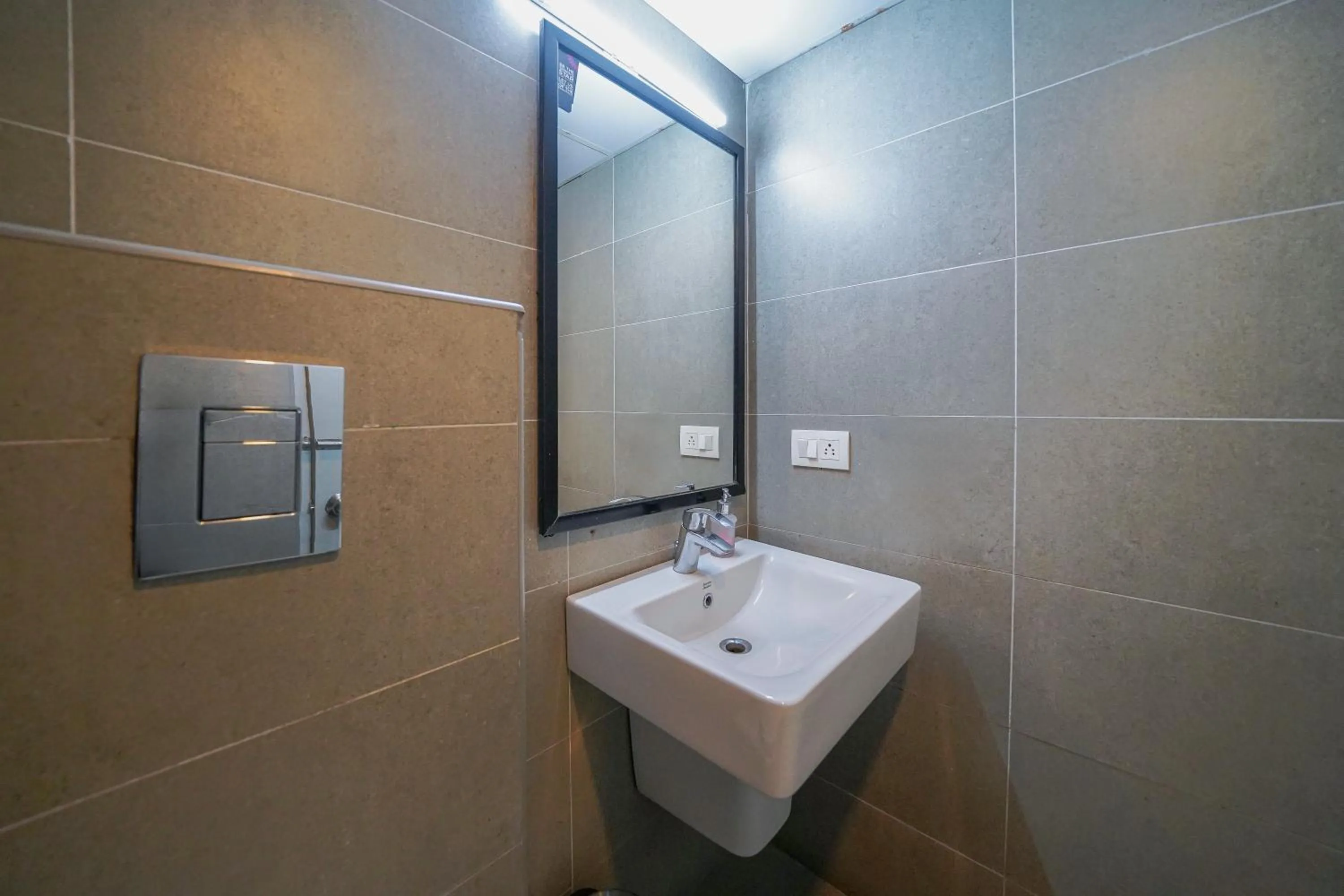 Bathroom in Olive Zip Richmond Circle by Embassy Group