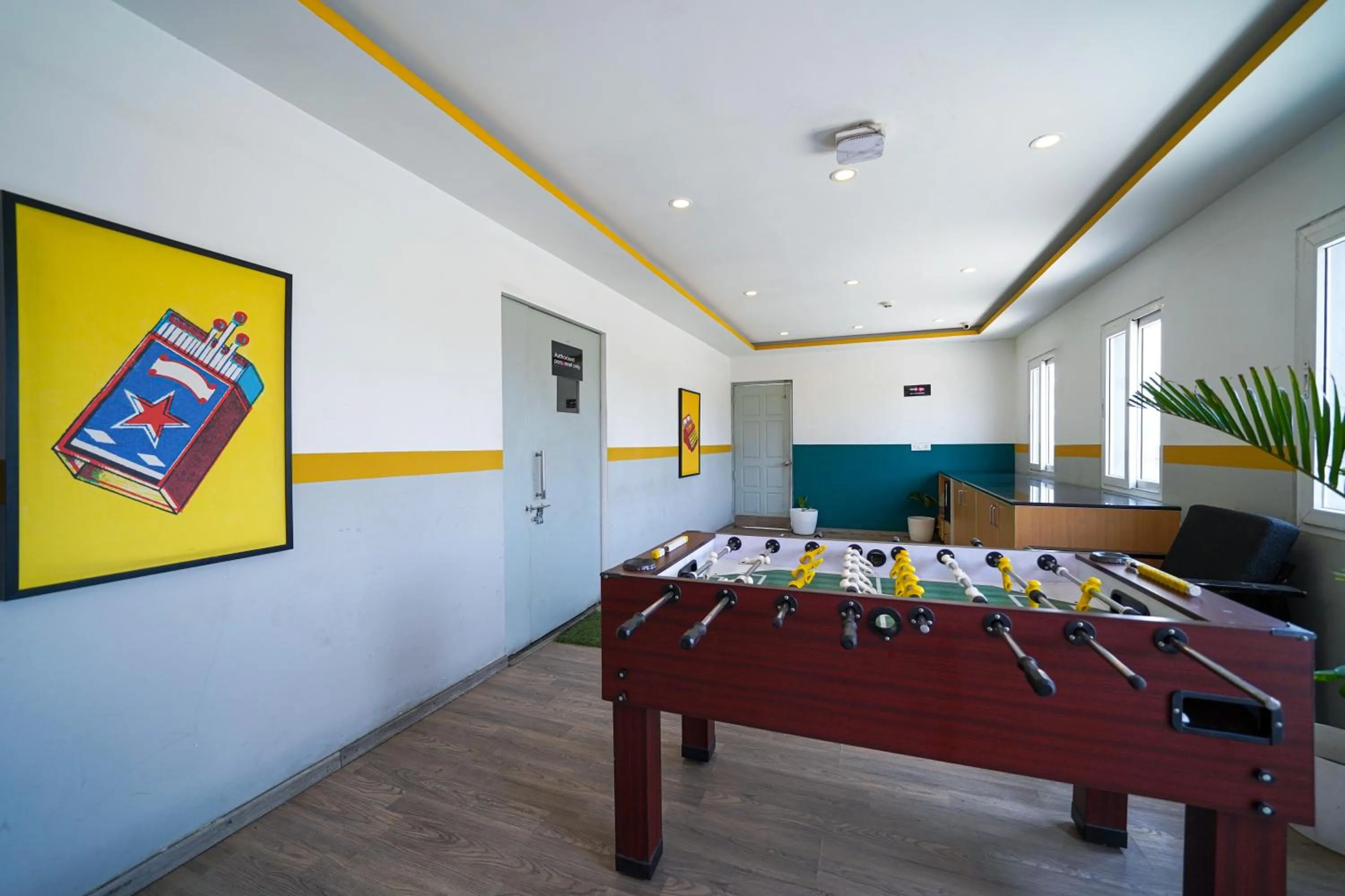 Game Room in Olive Zip Richmond Circle by Embassy Group