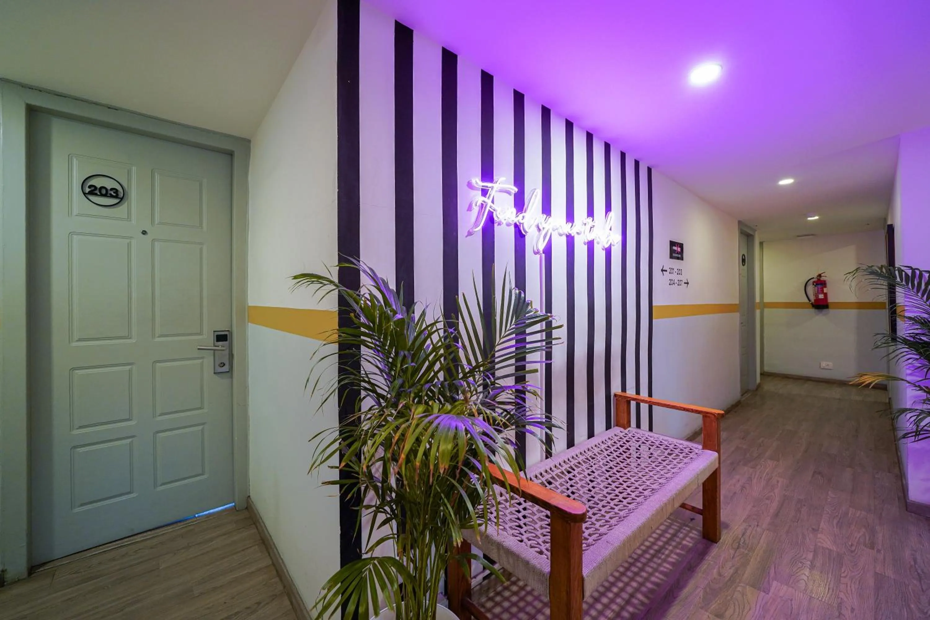 Seating area in Olive Zip Richmond Circle by Embassy Group