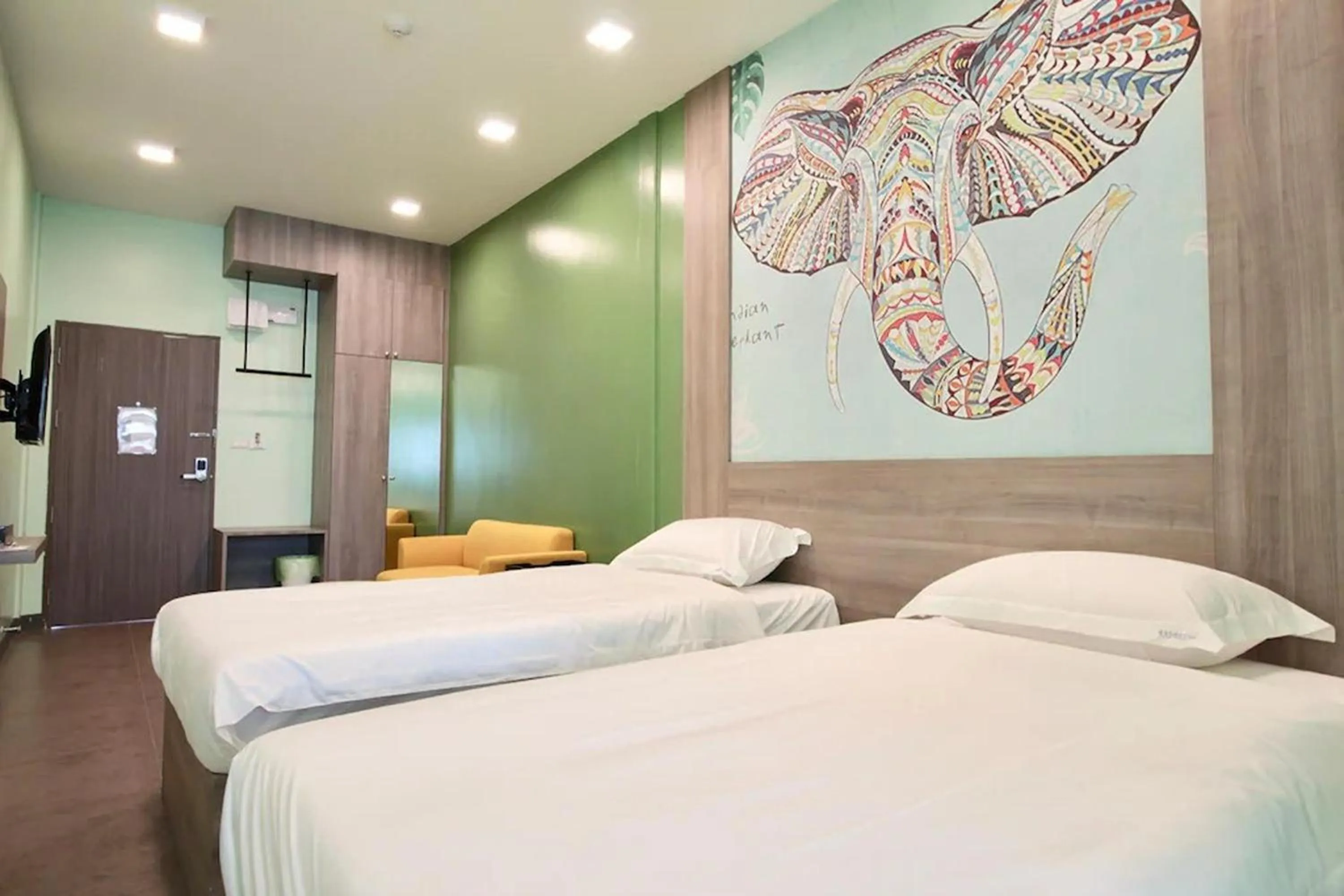 Bed in R 17 Living Hotel