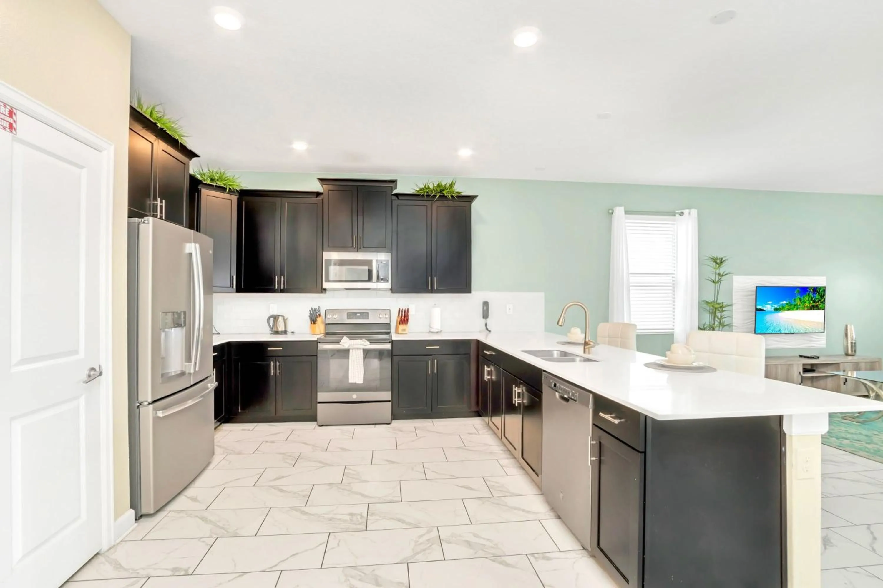 Kitchen or kitchenette in Stunning 8BR Home with BBQ Pool and Theater