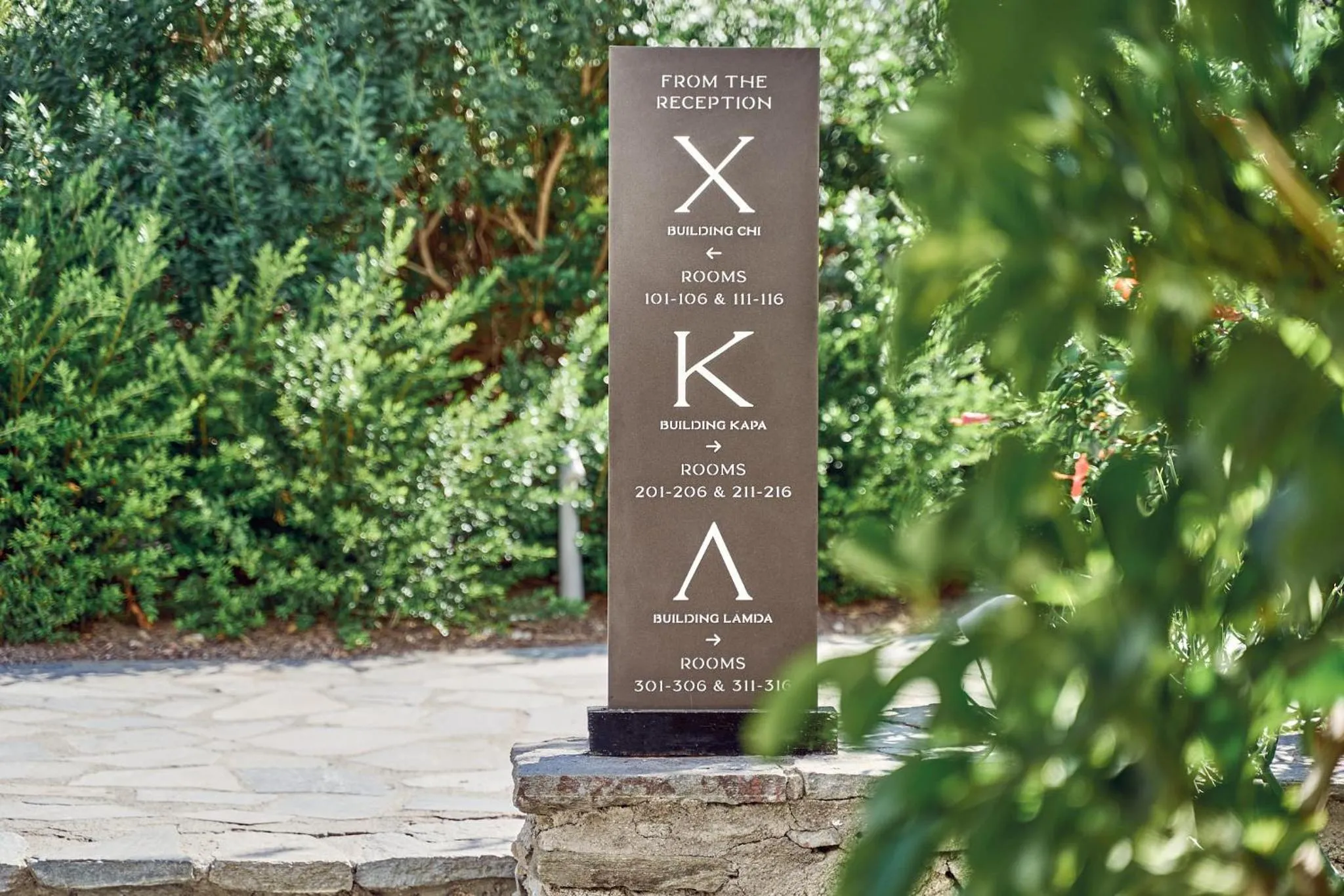 Property logo or sign in Mykonos Theoxenia, a Member of Design Hotels
