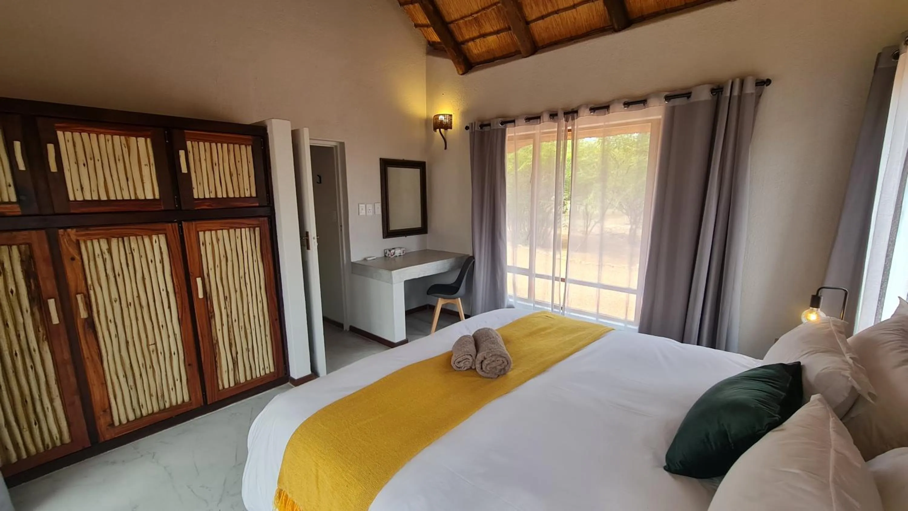 Seating area, Bed in Hoedspruit Bush Stay