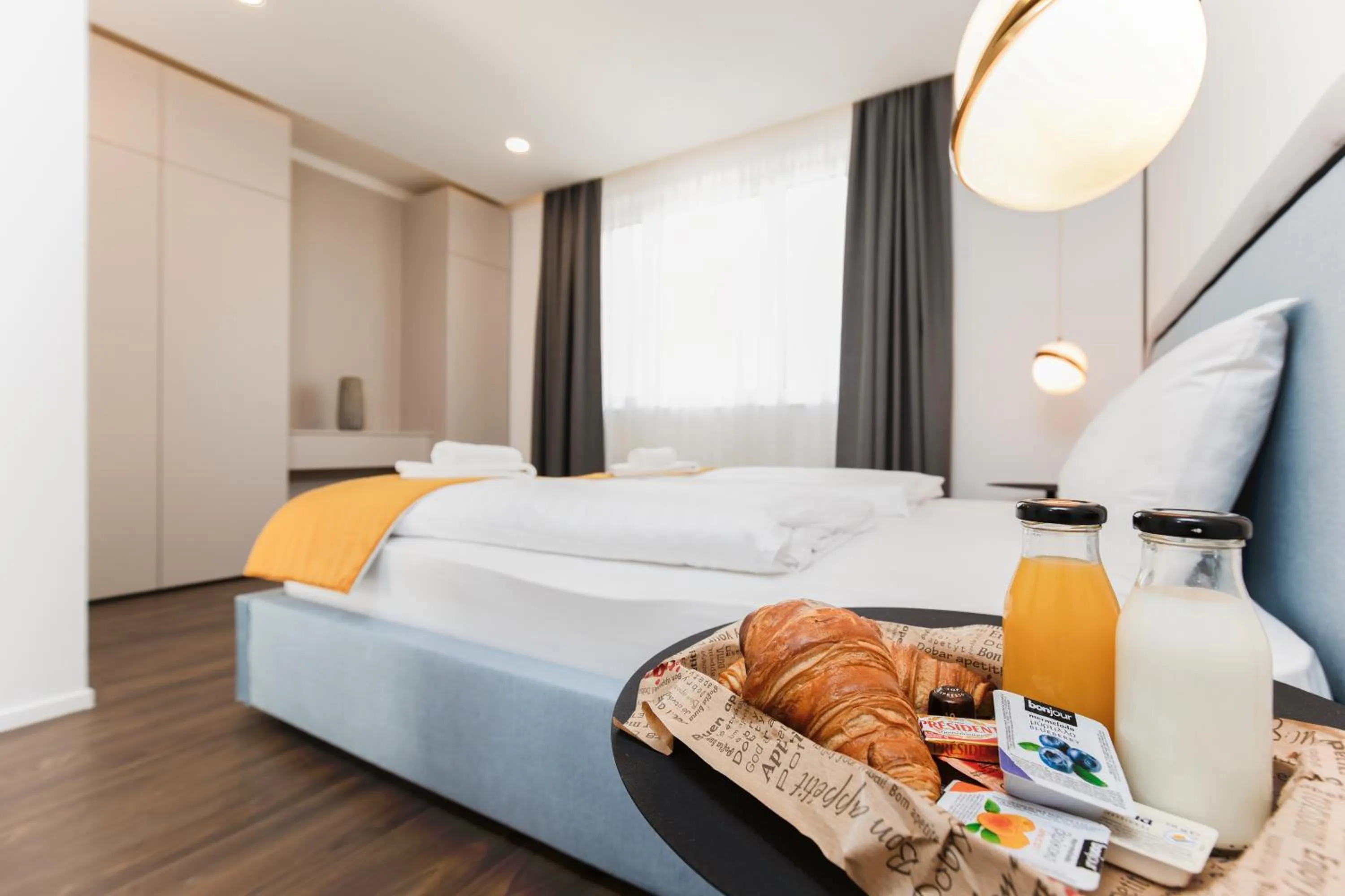 Bedroom, Bed in The Amberlyn Suite Hotel