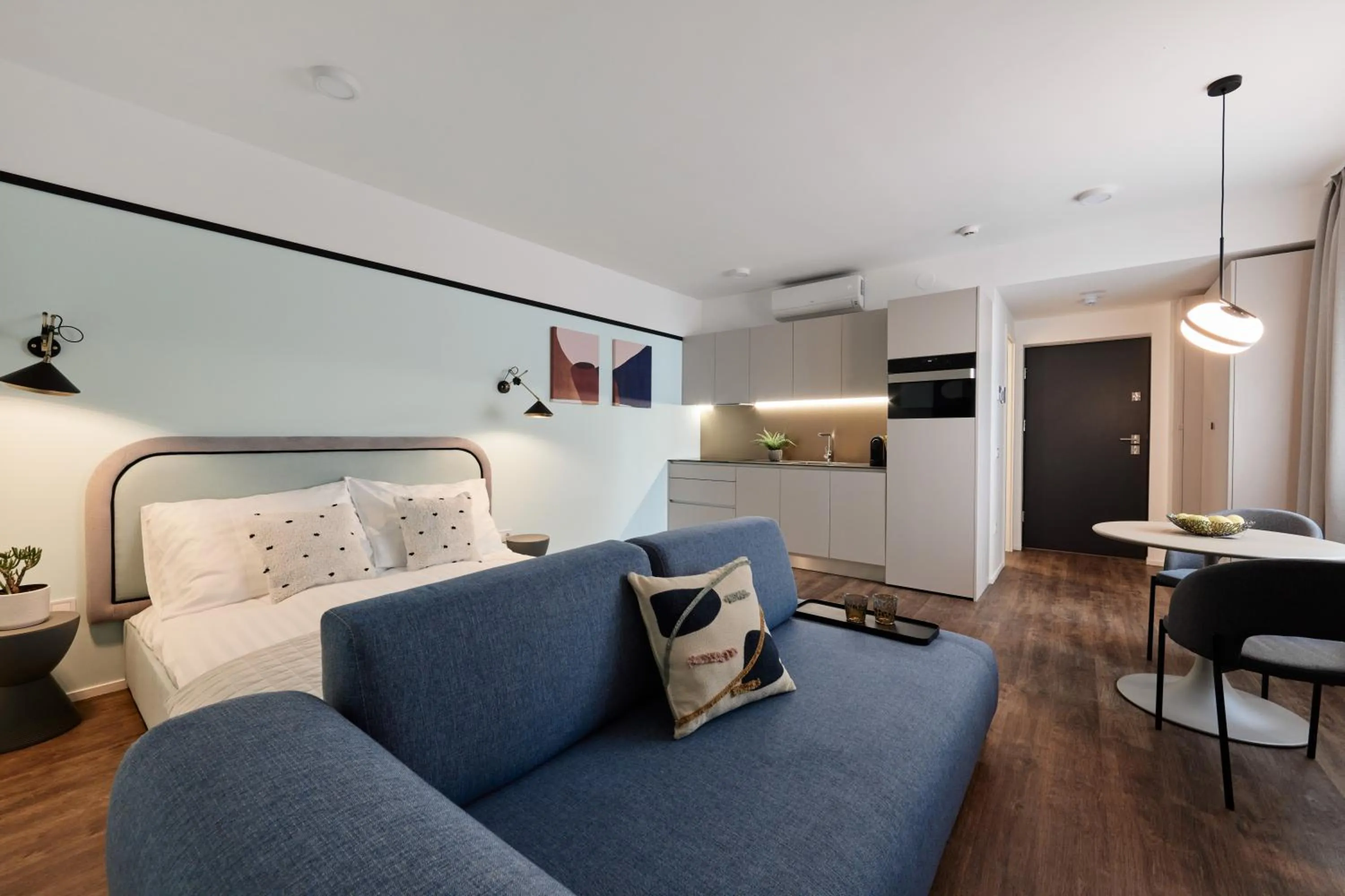 Bed in The Amberlyn Suite Hotel