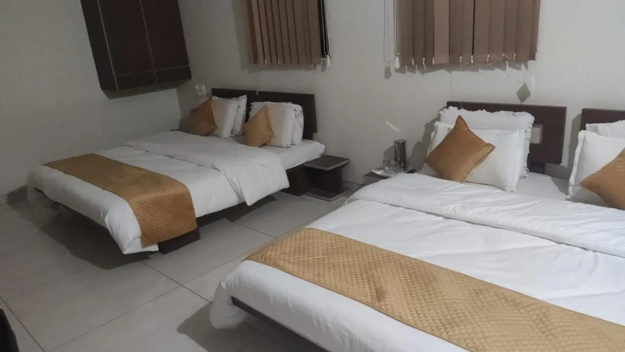 Bed in Indrani Hotel