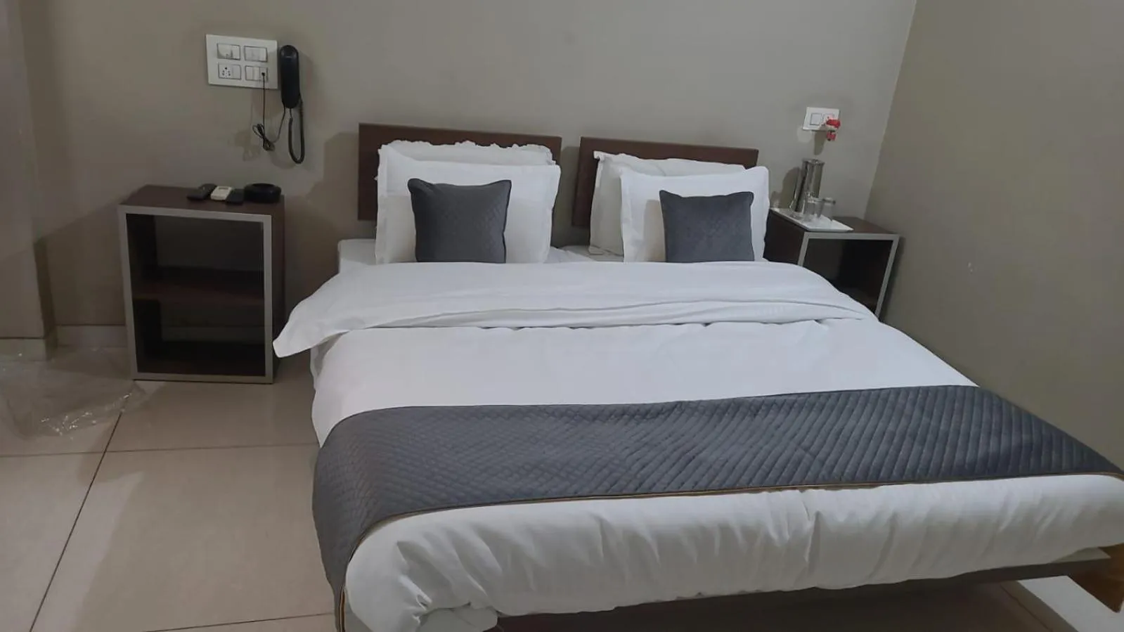 Bed in Indrani Hotel