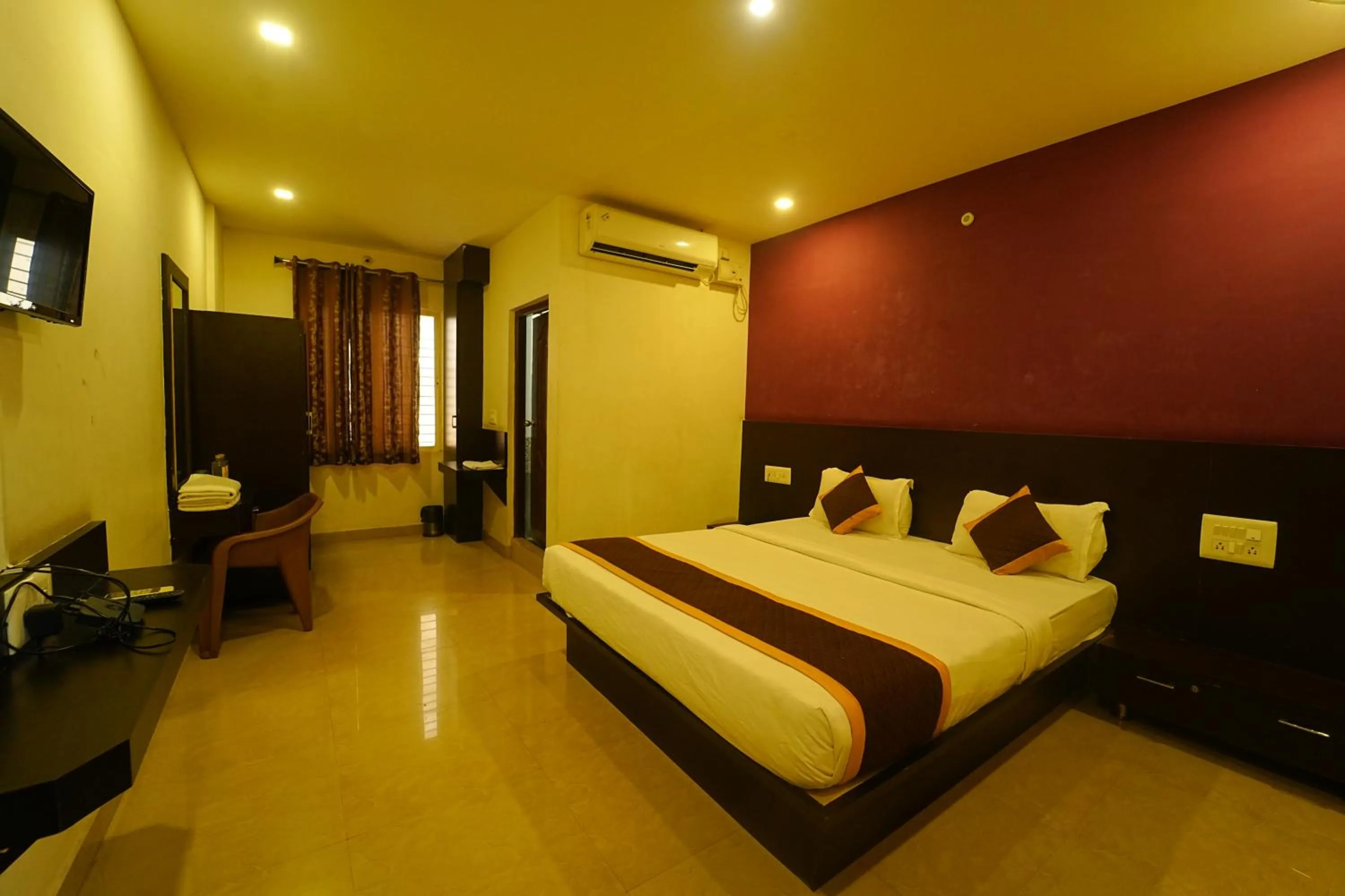 Bed in Yuvraj Galaxy Inn