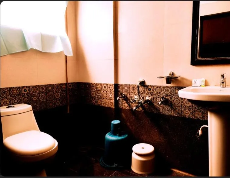 Bathroom in Yuvraj Galaxy Inn