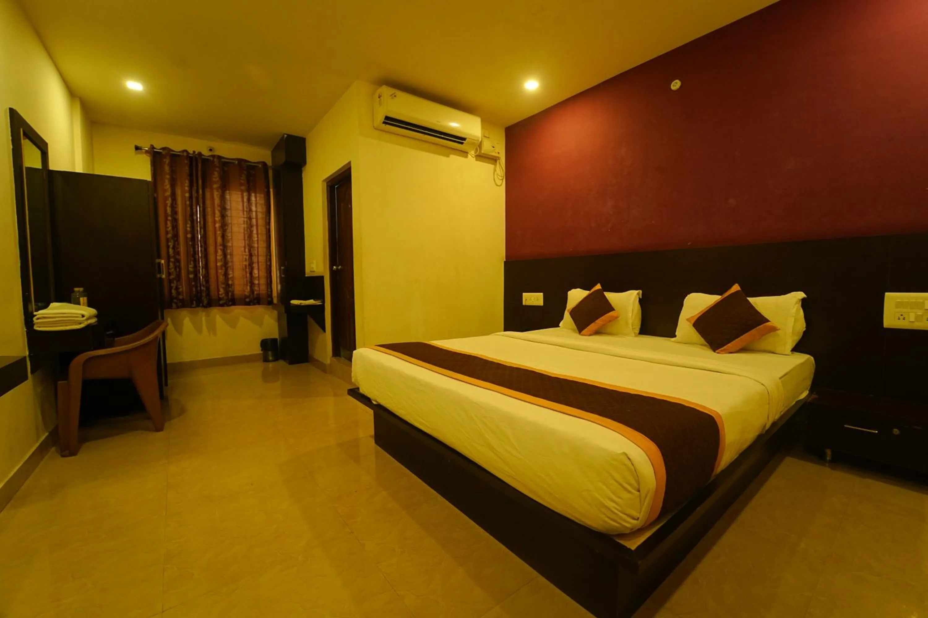 Bed in Yuvraj Galaxy Inn