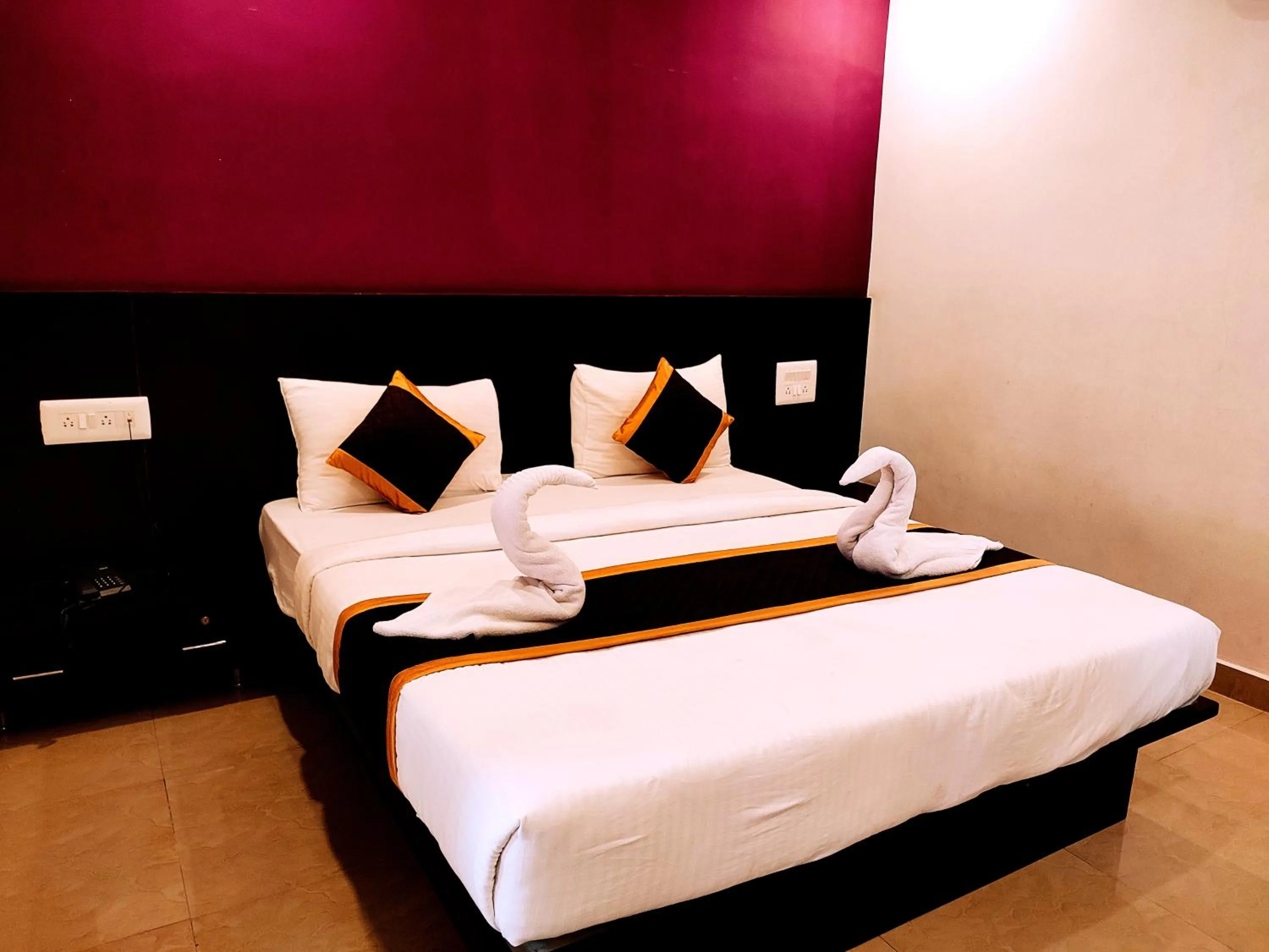 Bed in Yuvraj Galaxy Inn