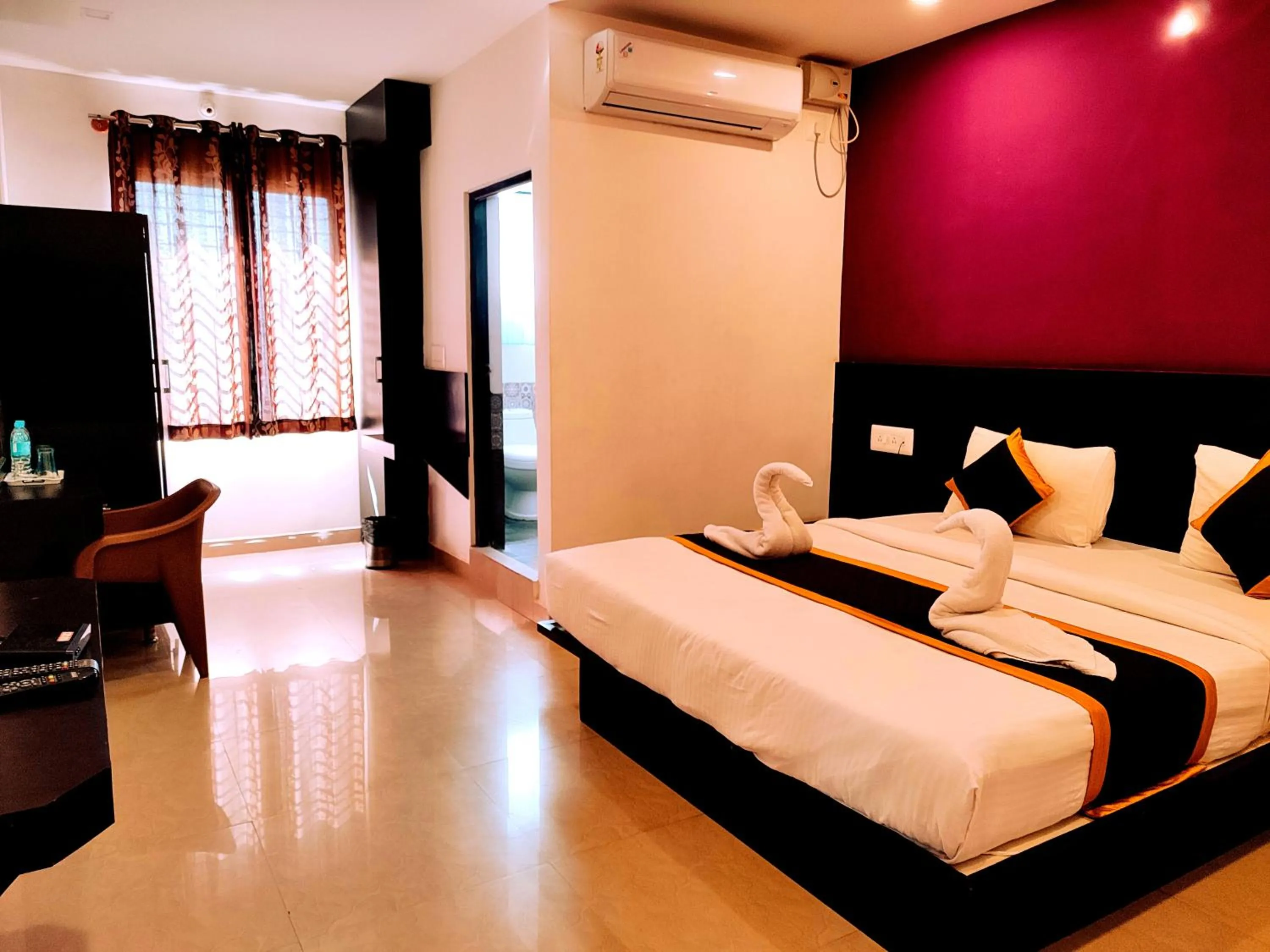 Bed in Yuvraj Galaxy Inn