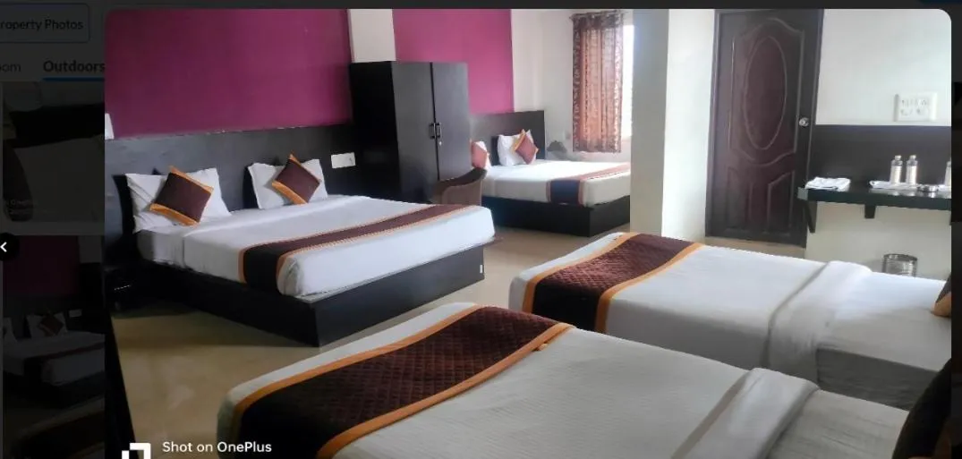 Bed in Yuvraj Galaxy Inn