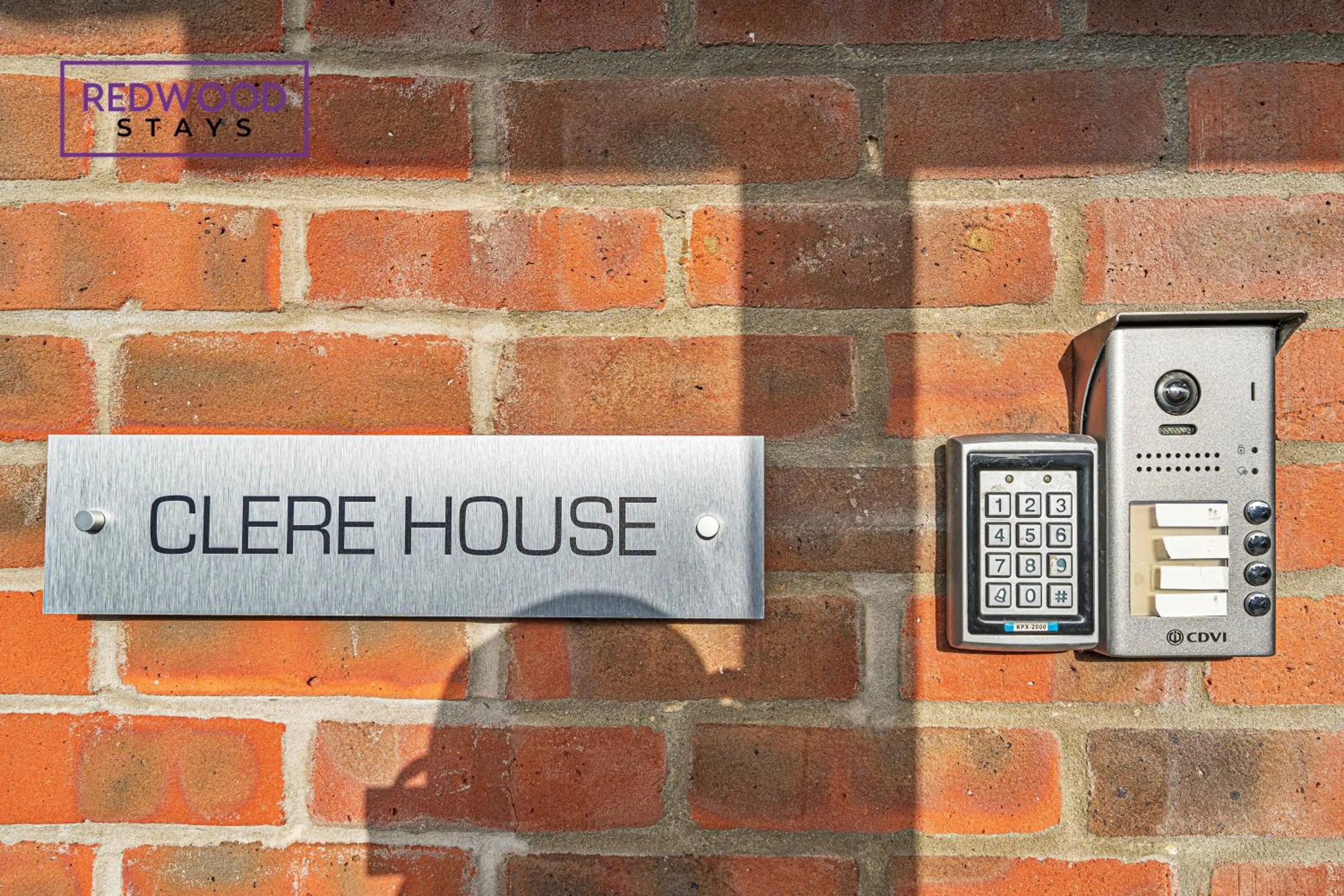 Property logo or sign in Modern Serviced Apartments For Contractors & Families with Free Parking, WiFi & Netflix By Redwood Stays