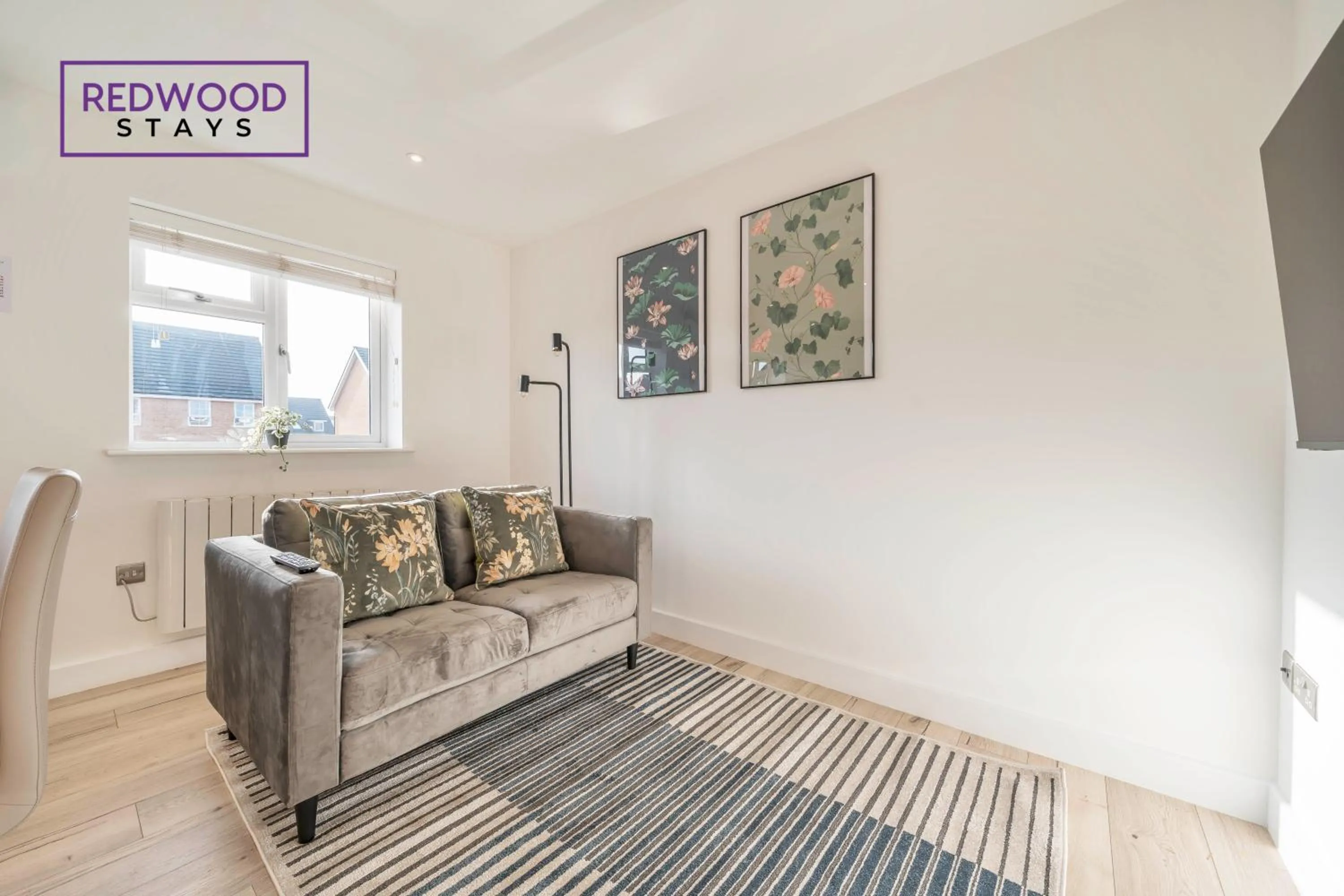 Living room in Modern Serviced Apartments For Contractors & Families with Free Parking, WiFi & Netflix By Redwood Stays