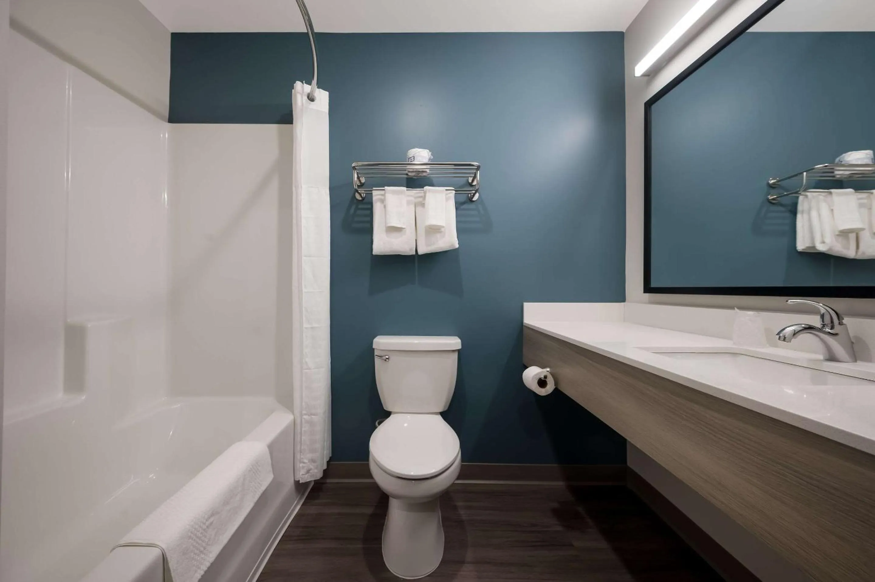 Shower in WoodSpring Suites Wixom - Novi