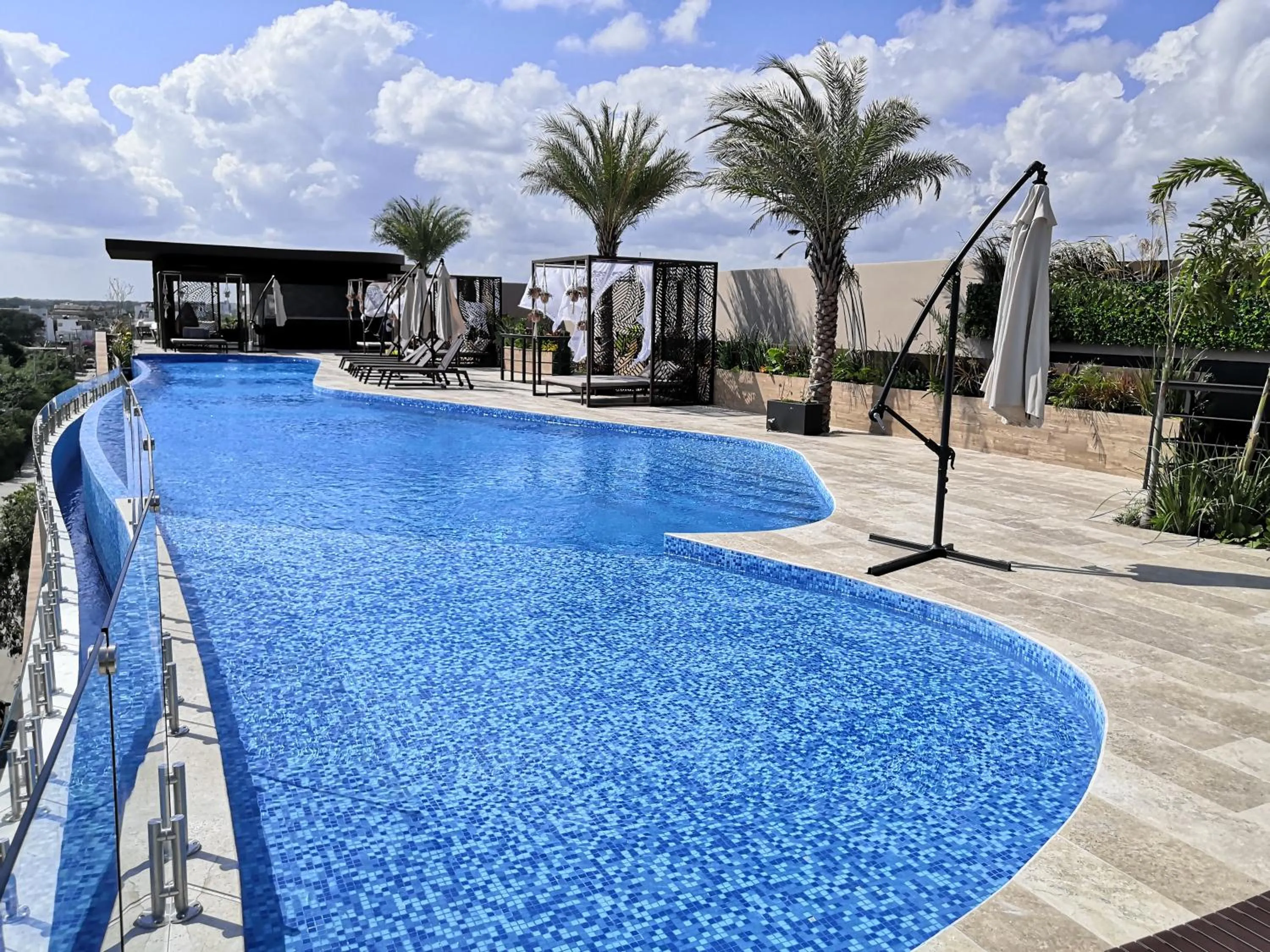 Swimming pool in Menesse Tulum Luxury Apartments by Spot Rentals