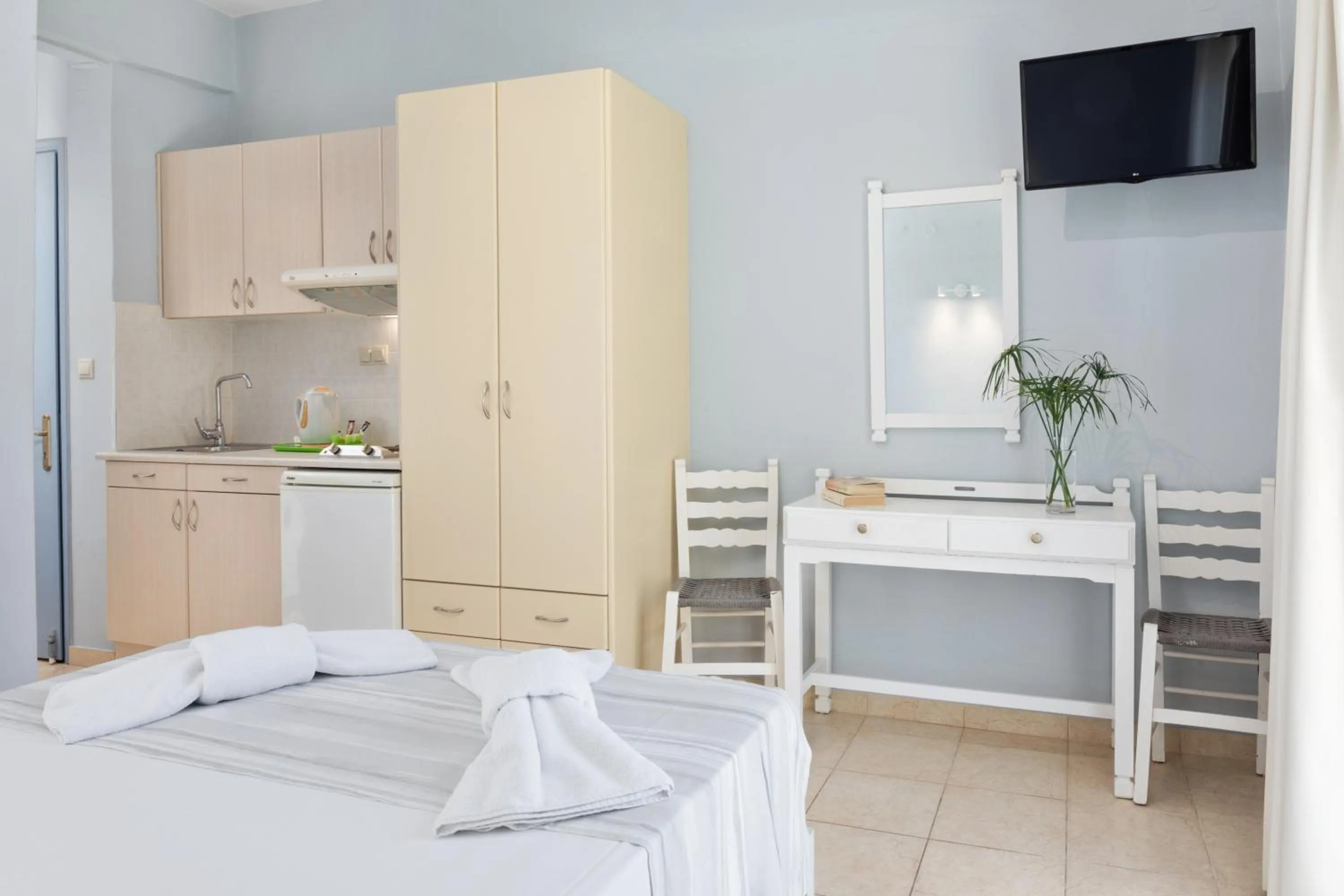 Bed in Bella Vista Beach Hotel