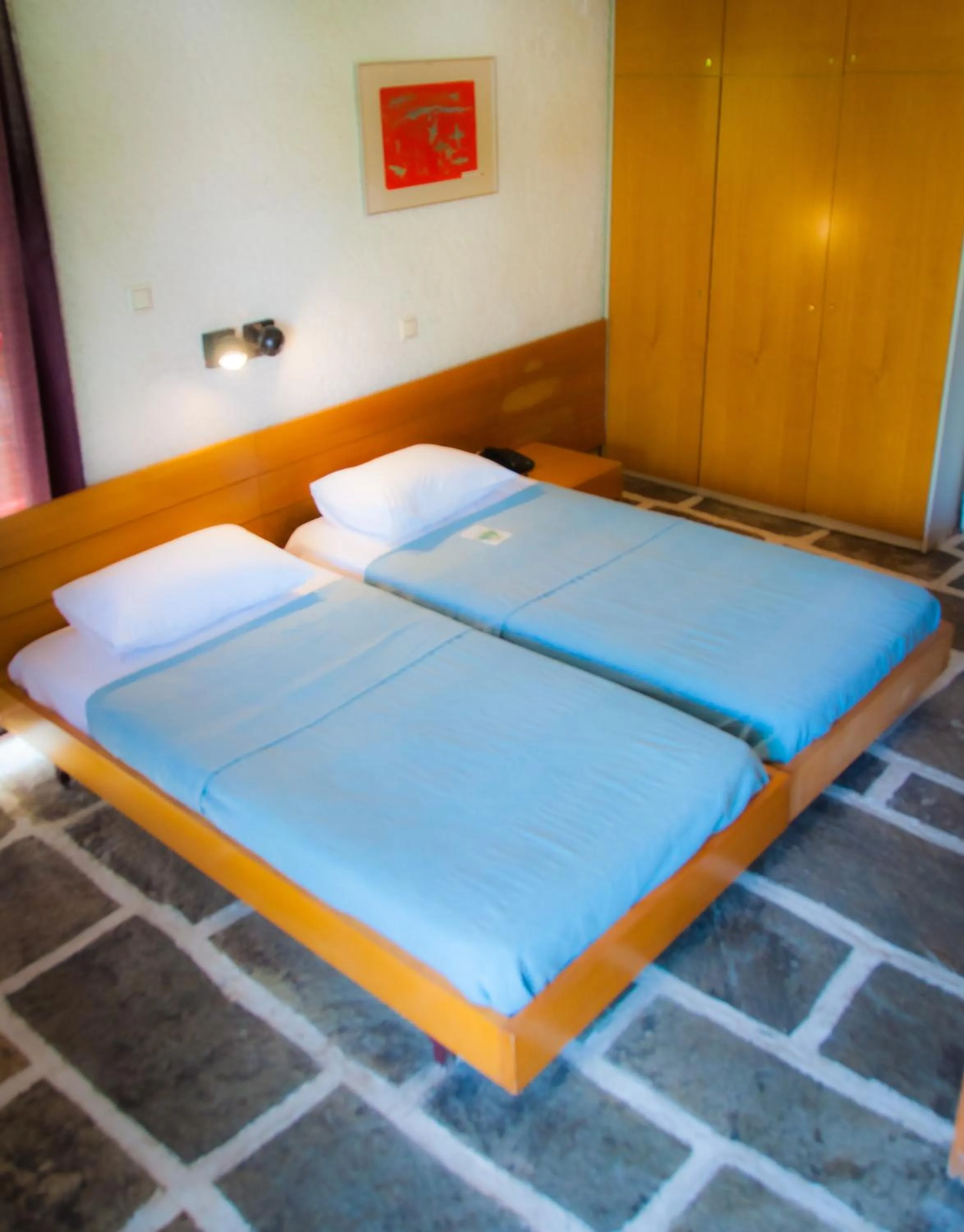 Bedroom in Apollonia Hotel Apartments