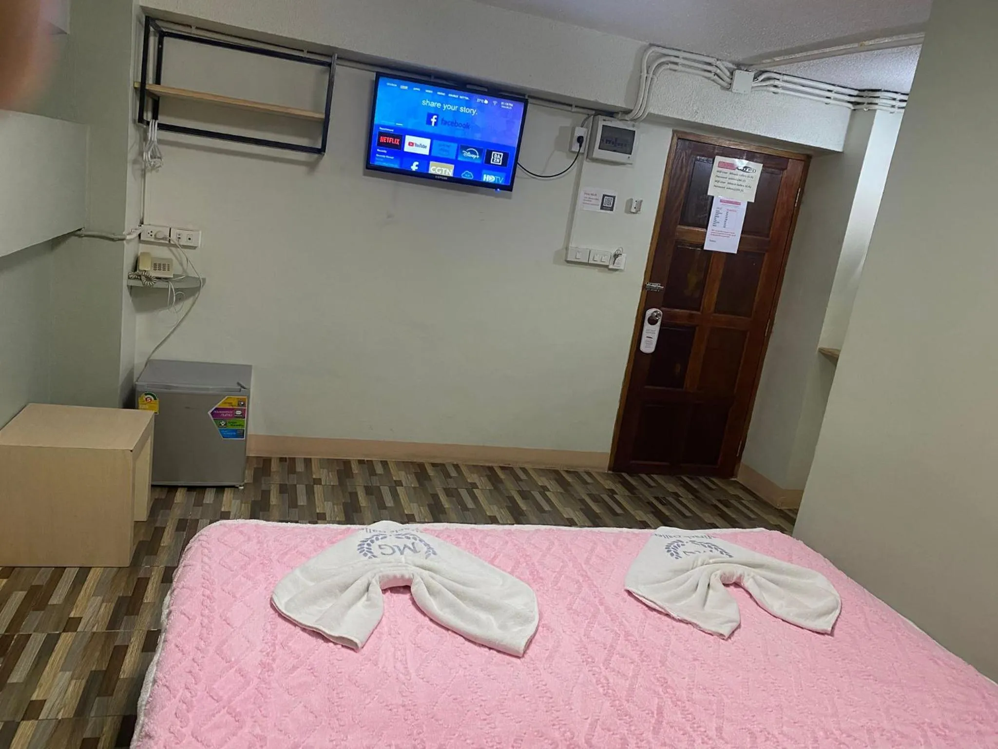 Bed in Miracle Gallery Hotel