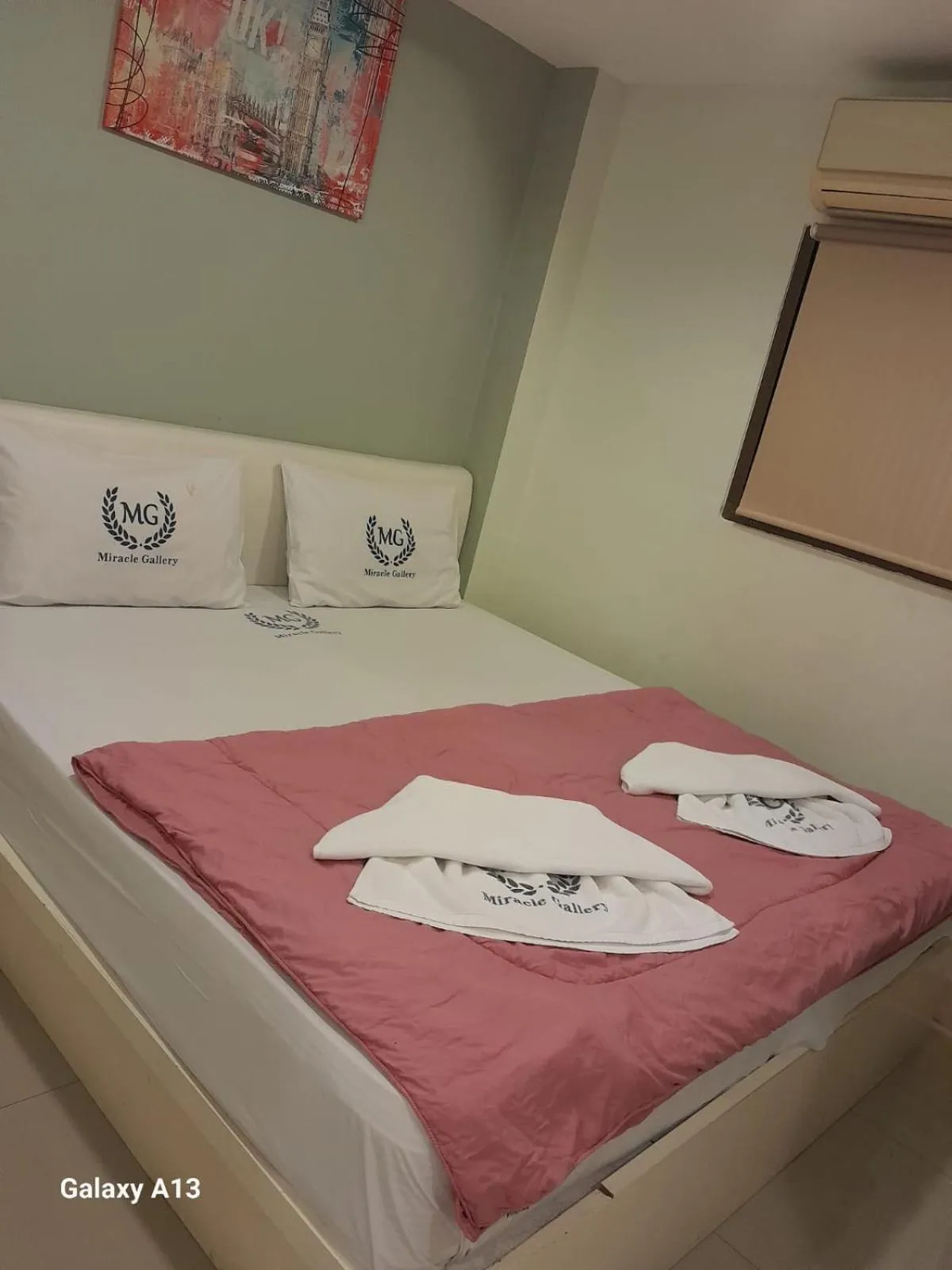Bed in Miracle Gallery Hotel