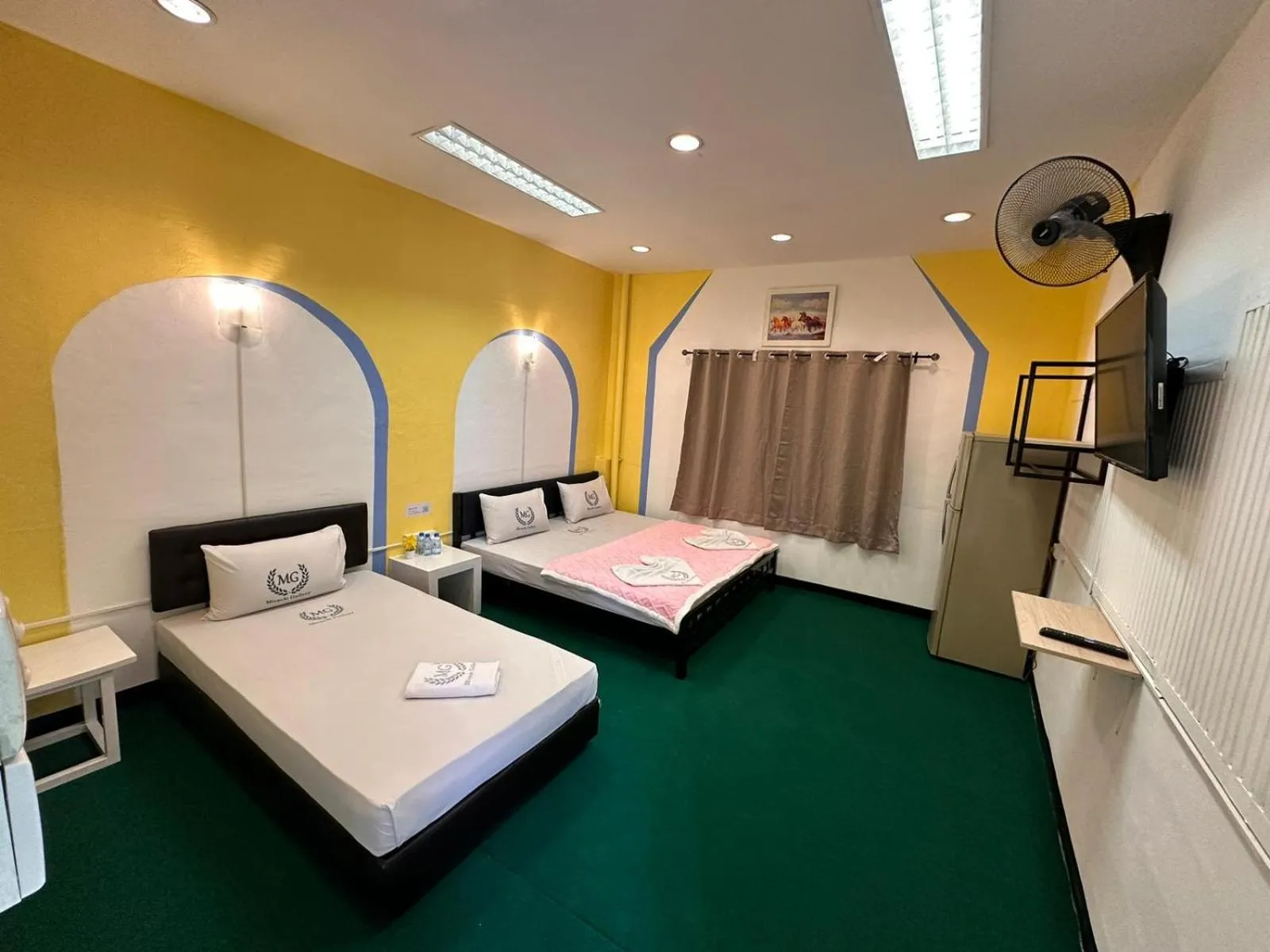 Bed in Miracle Gallery Hotel