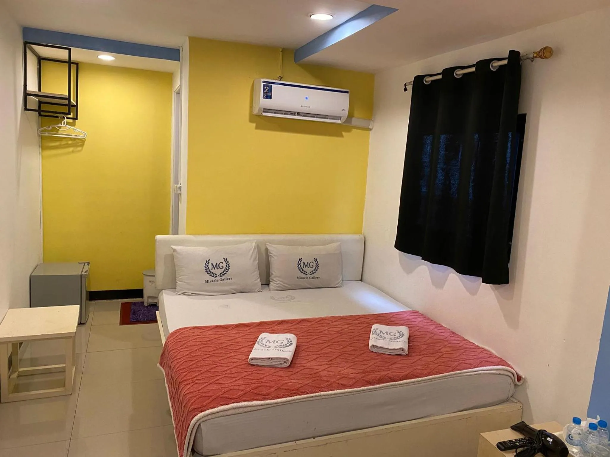 Bed in Miracle Gallery Hotel