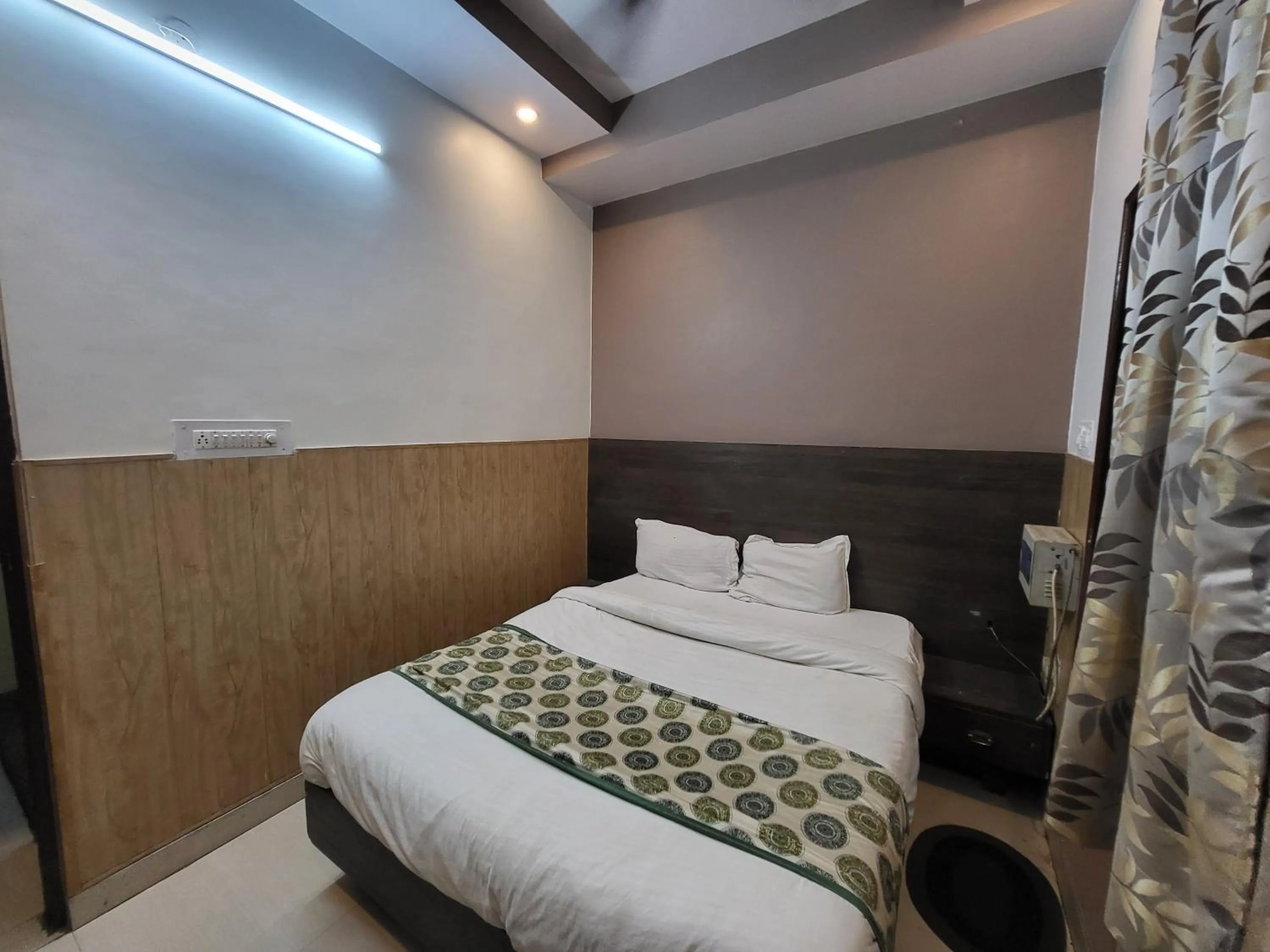 Bed in Hotel Atithi Residency
