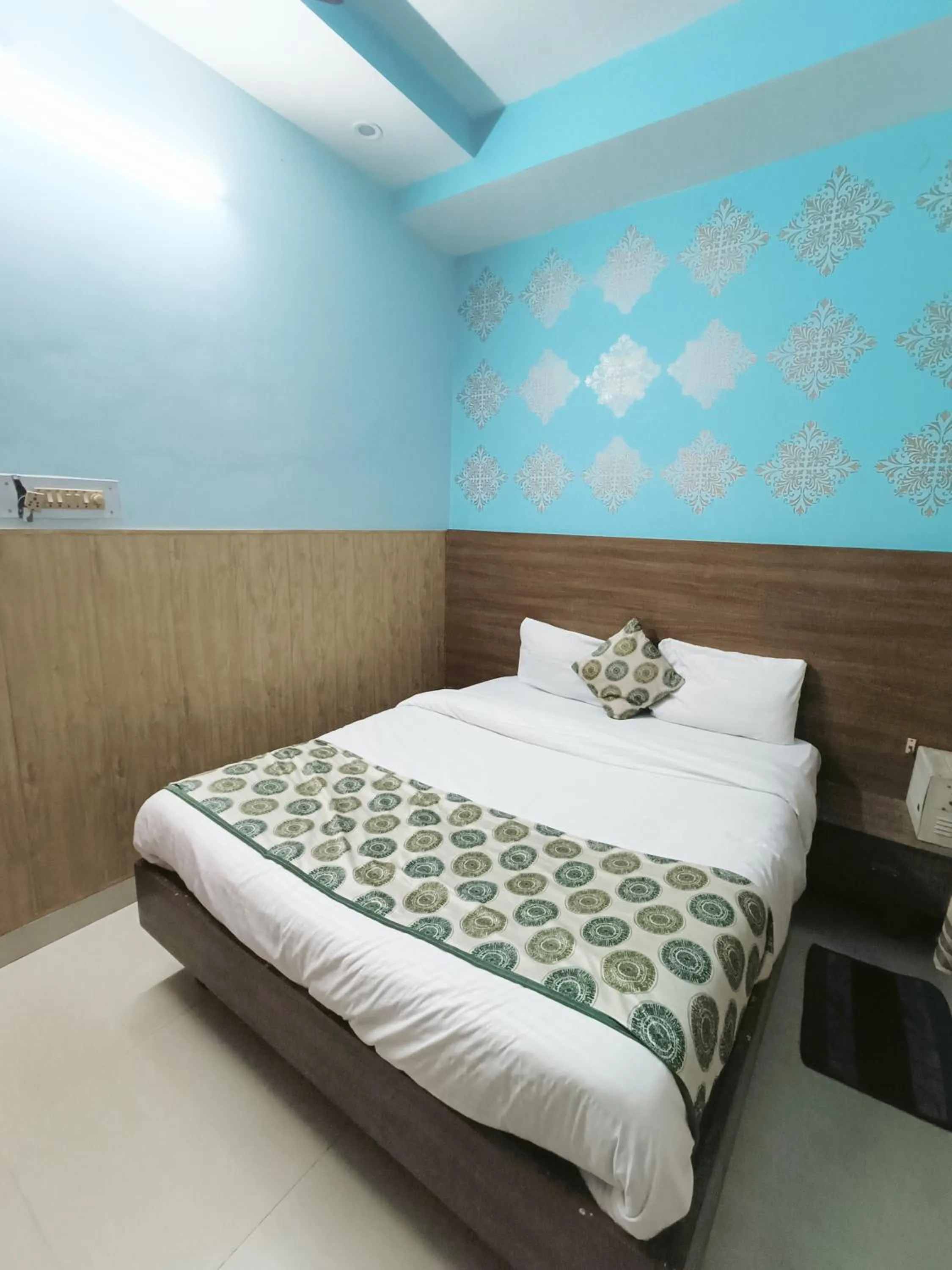 Bed in Hotel Atithi Residency
