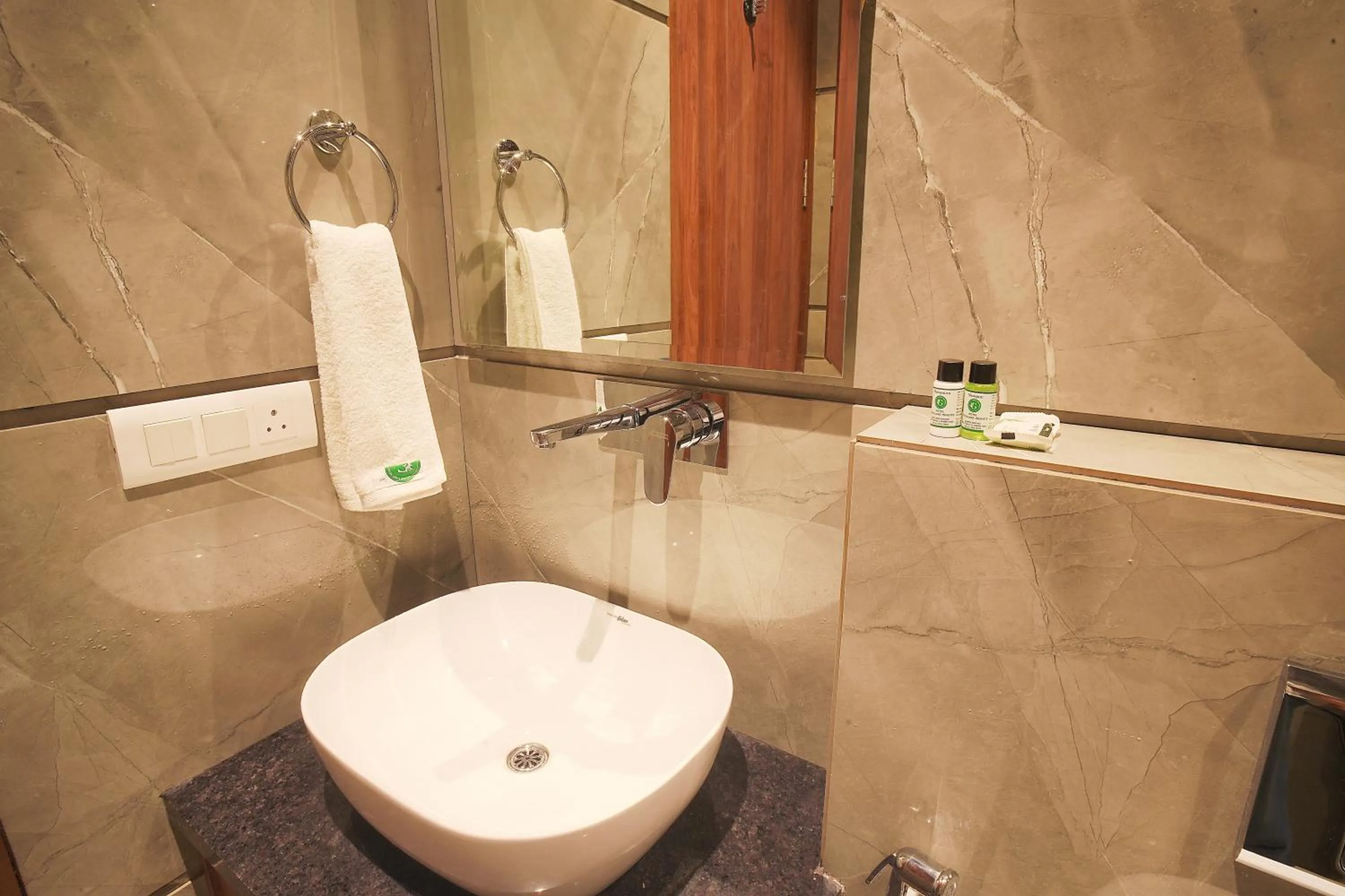 Shower in Hotel Green Land Heights