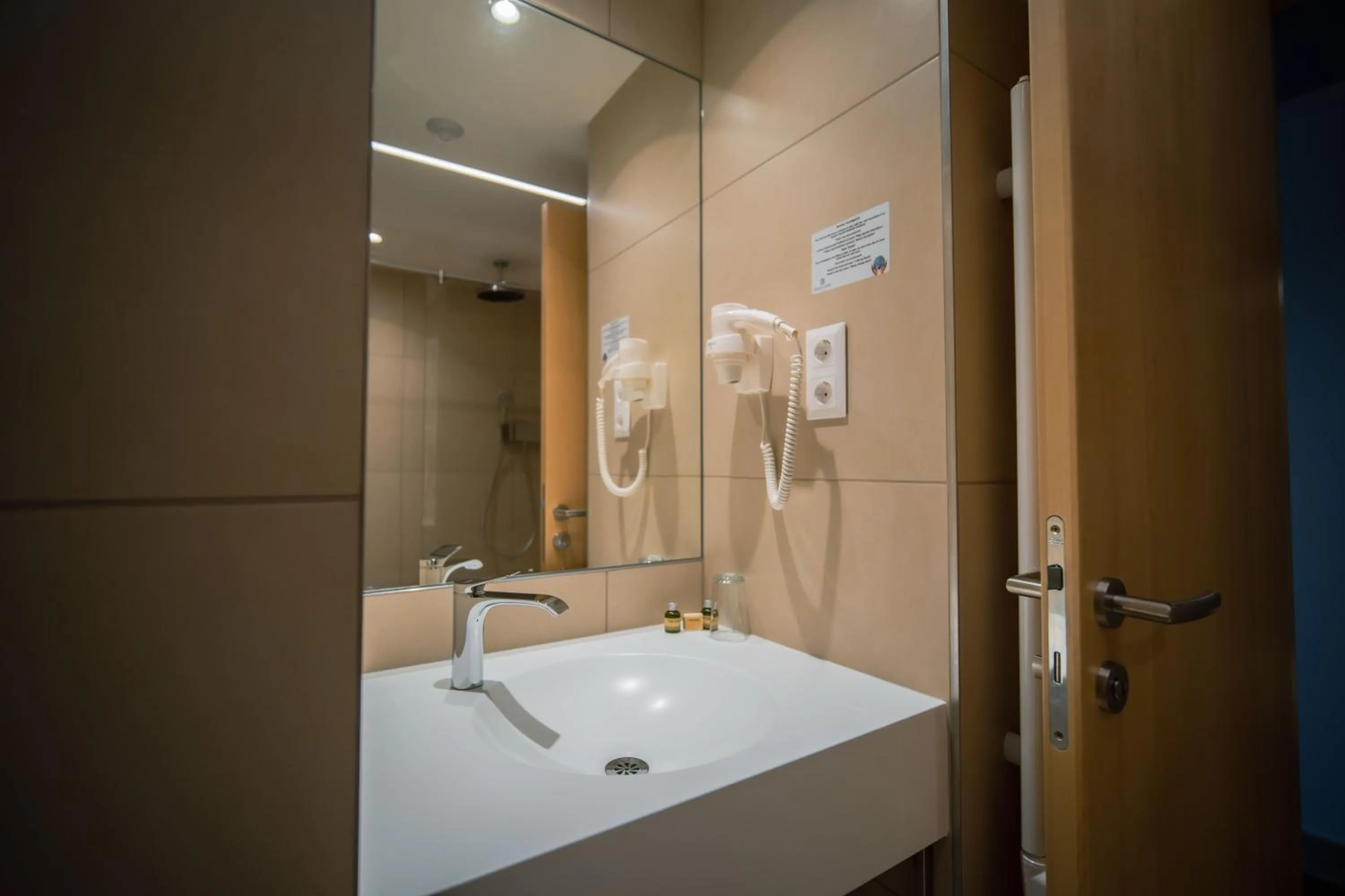 Bathroom in Eleven Business & Sport Hotel