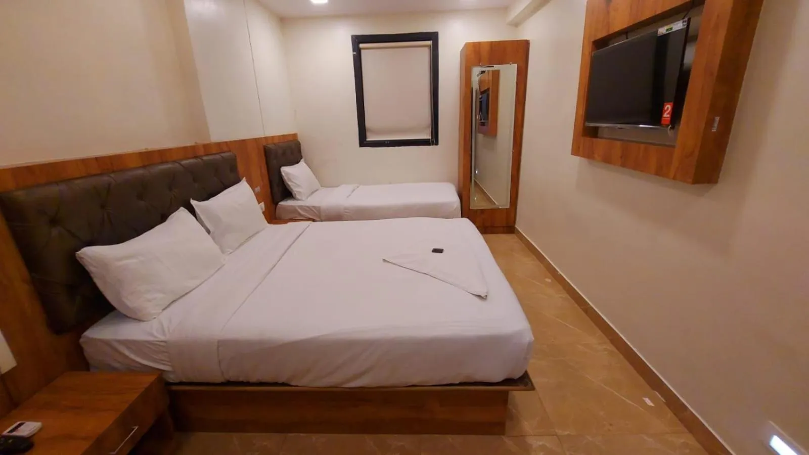 Bed in HOTEL RIGGA INN KOKILABEN DHIRUBHAI AMBANI Hospital