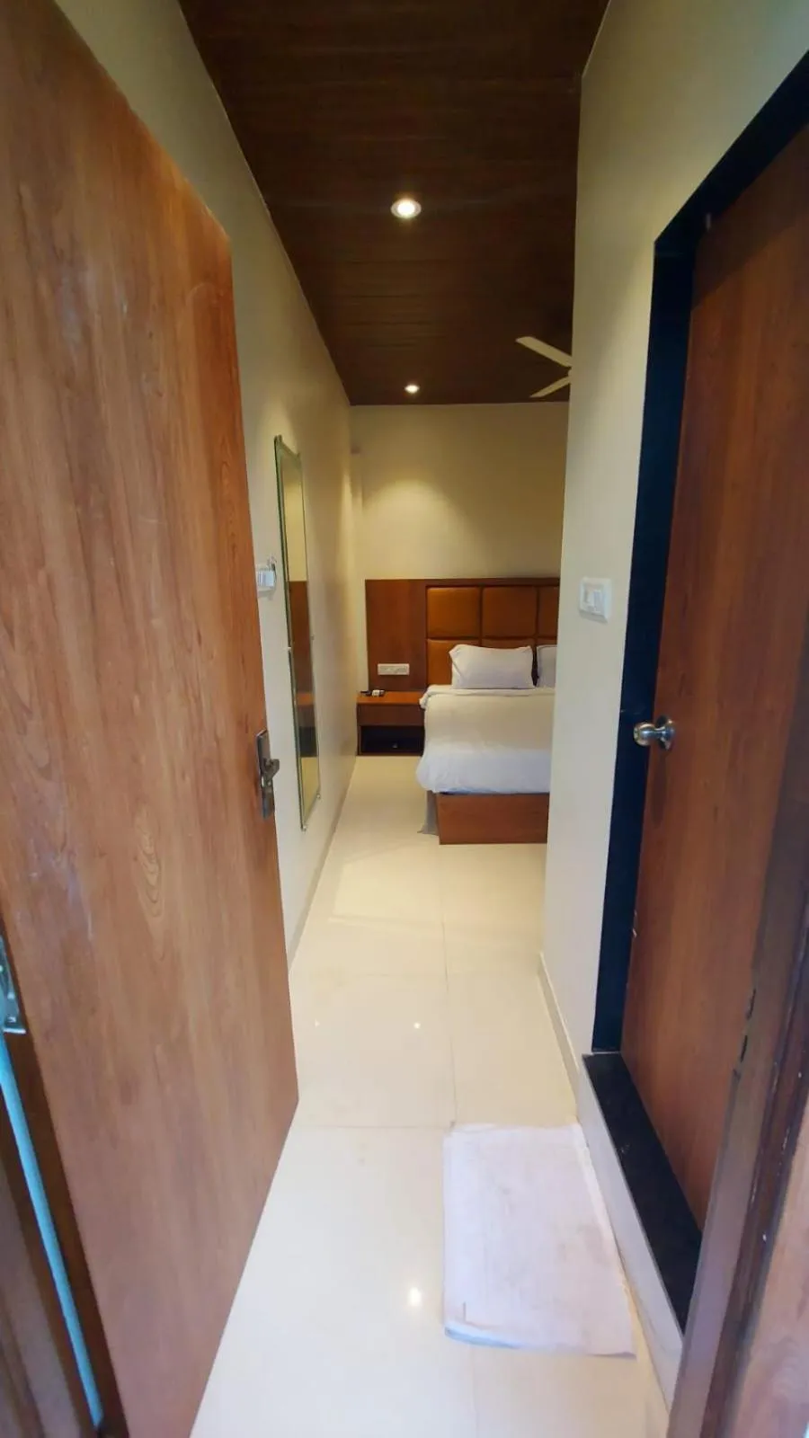 Photo of the whole room, Bed in HOTEL RIGGA INN KOKILABEN DHIRUBHAI AMBANI Hospital