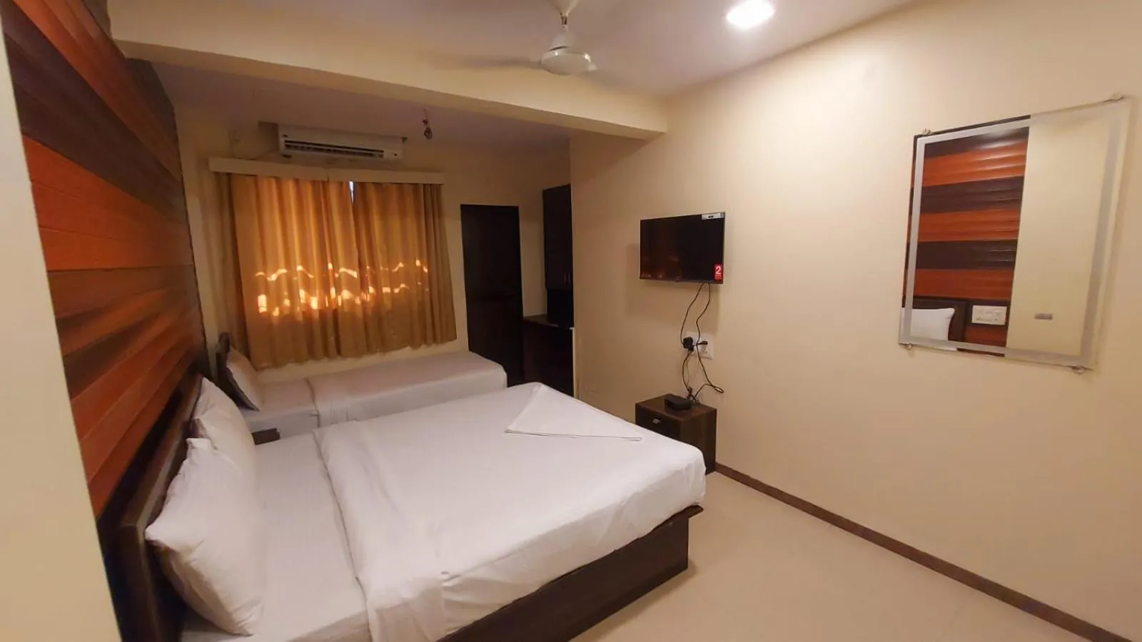 Photo of the whole room, Bed in HOTEL RIGGA INN KOKILABEN DHIRUBHAI AMBANI Hospital