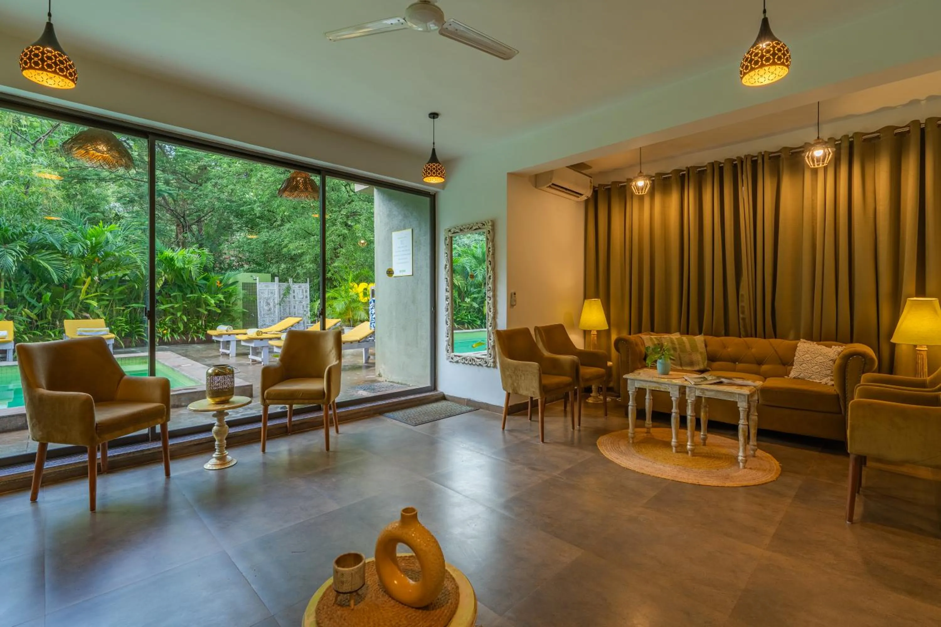 Seating area in Locomo Boutique, Morjim - Cozy tropical stay, near beach